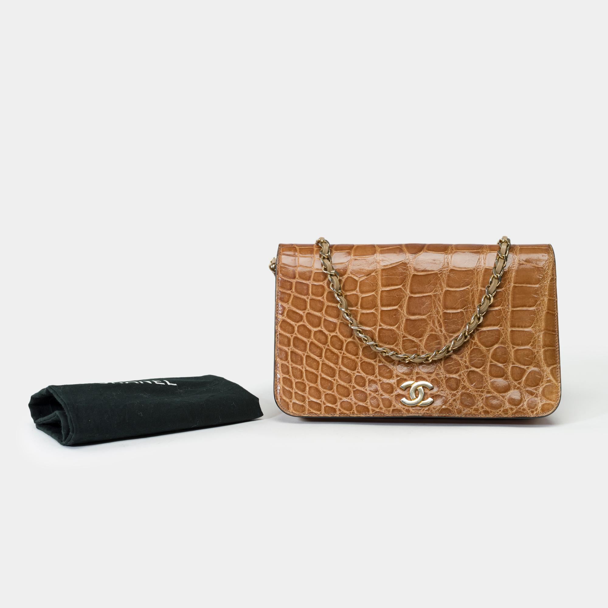 Stunning​ ​&​ ​Rare​ ​Chanel​ ​Full​ ​Flap​ ​shoulder​ ​bag​ ​in​ ​beige​ ​Mississippiensis​ ​Alligator​ ​leather,​ ​with​ ​champagne​ ​gold​ ​trim,​ ​beige​ ​leather​ ​interior,​ ​and​ ​interwoven​ ​beige​ ​leather​ ​chain​ ​handle​ ​for​ ​hand​