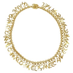 CHANEL 'CHANEL' Gold Metal Chain Logo Choker Necklace