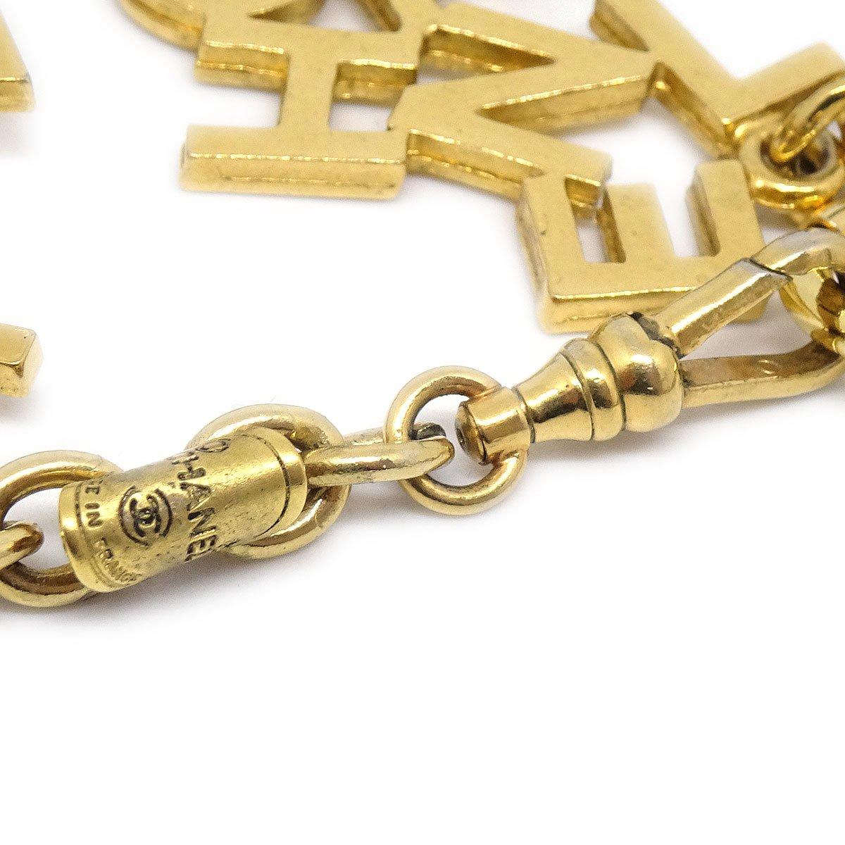 CHANEL 'CHANEL' Gold Metal Logo Charm Link Chain Necklace  In Good Condition For Sale In Chicago, IL