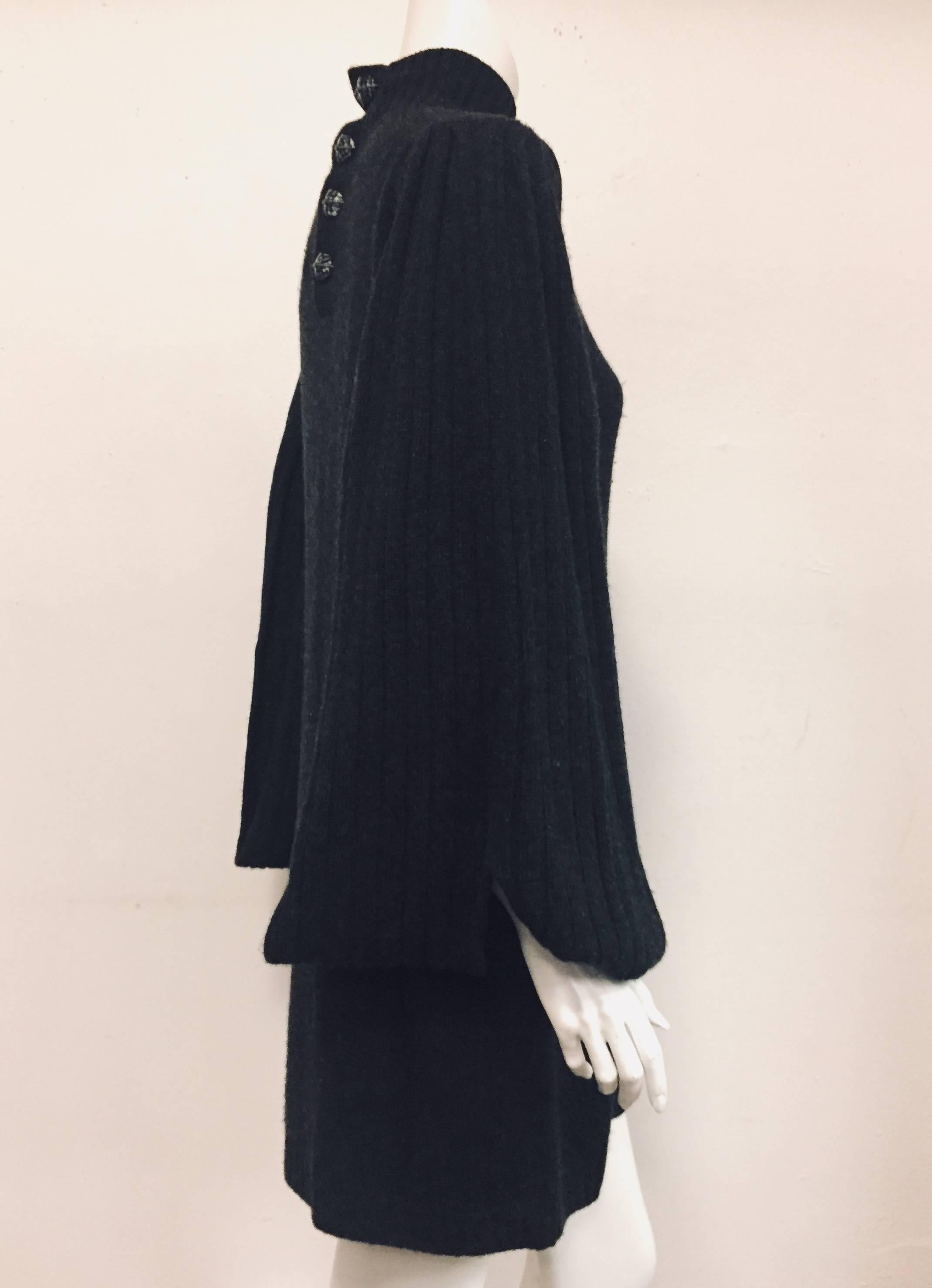 Charcoal color Chanel cashmere long sleeve sweater dress featuring ribbed knit stand collar and long open shawl sleeves.  This soft cashmere charcoal fitted sweater dress with drape style long sleeves is short enough that it can be, also, worn with