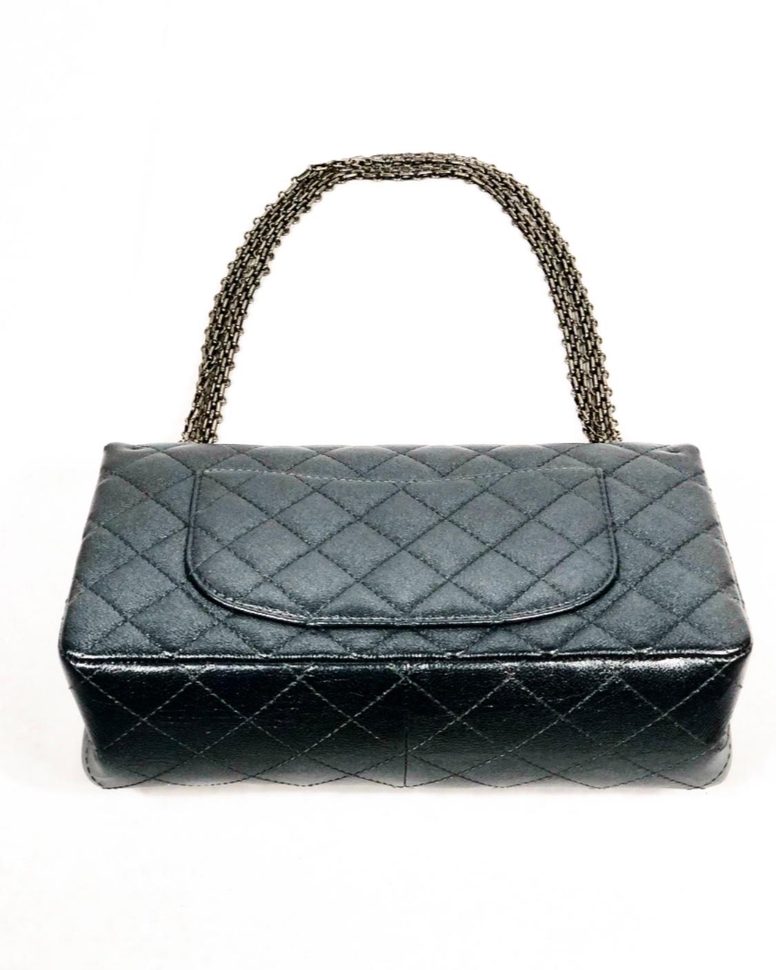 CHANEL Charcoal Sheepskin Ruthenium Metal Reissue 2.55 Double Flap Handbag

Product details:
The bag comes with the original dust bag, box and authentication car
Ruthenium- finish hardware
Snap closure at front with additional Mademoiselle turn-lock