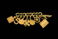 Chanel charm brooch Summer 1995