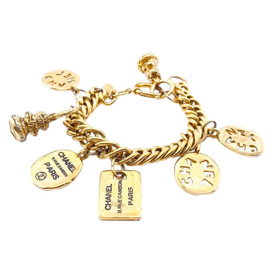 CHANEL Charms Bracelet in Gilt Metal For Sale