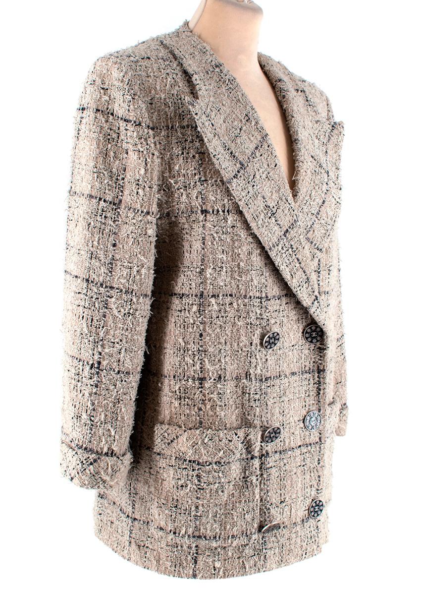 Chanel Checkered Cotton Tweed Double Breasted Collarless Jacket 

-Made of soft cotton tweed
-Gorgeous cream and black checkered pattern 
-Classic collarless double breasted cut
-Legendary cc logo to the buttons 
-Branded metal buttons with