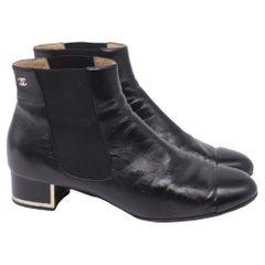 Chanel Chelsea Boots with Metallic Heel Trim in Black Leather