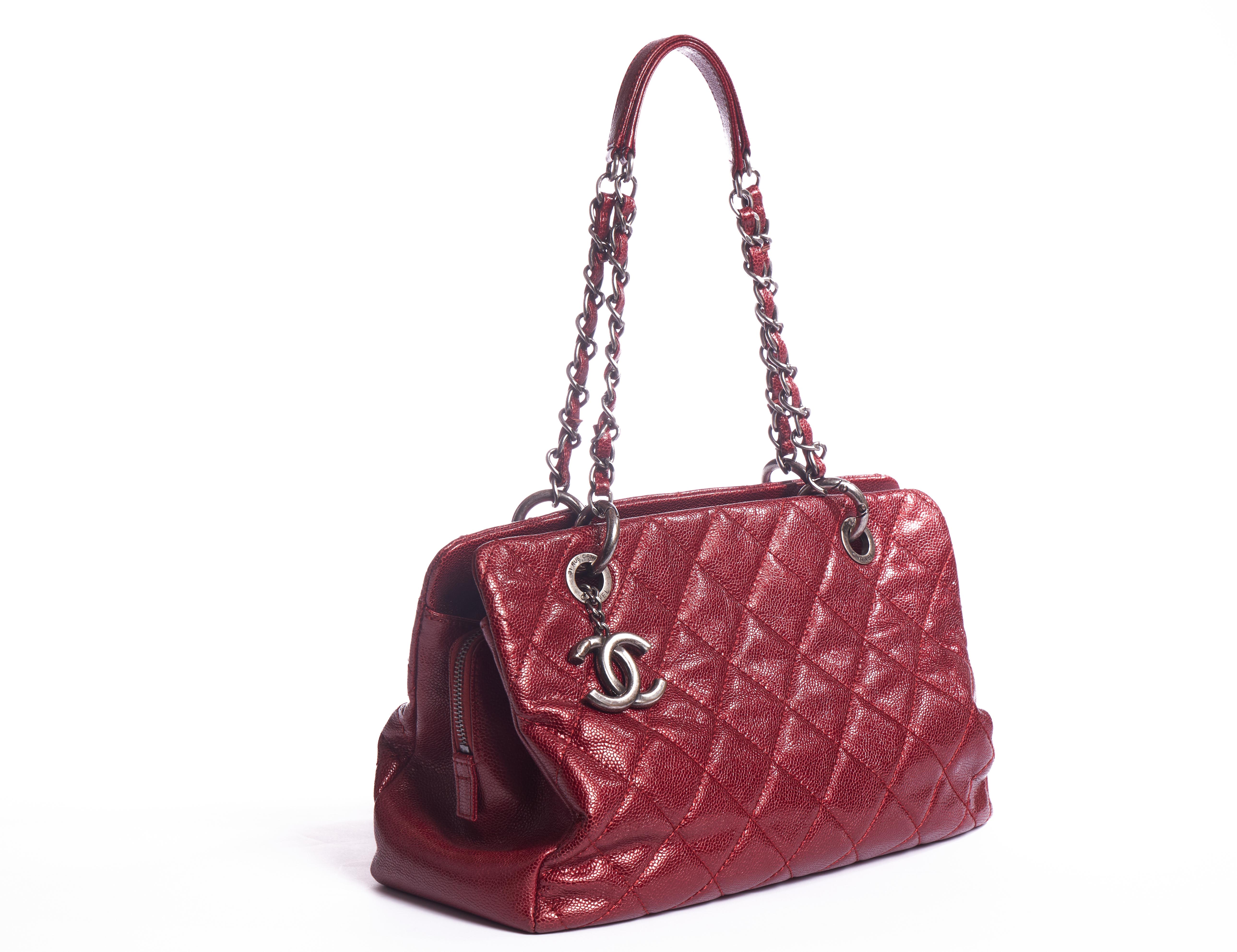 Chanel cherry red shiny caviar leather shoulder tote with gunmetal hardware. One zipped center compartment and 2 side open ones. Shoulder drop 9