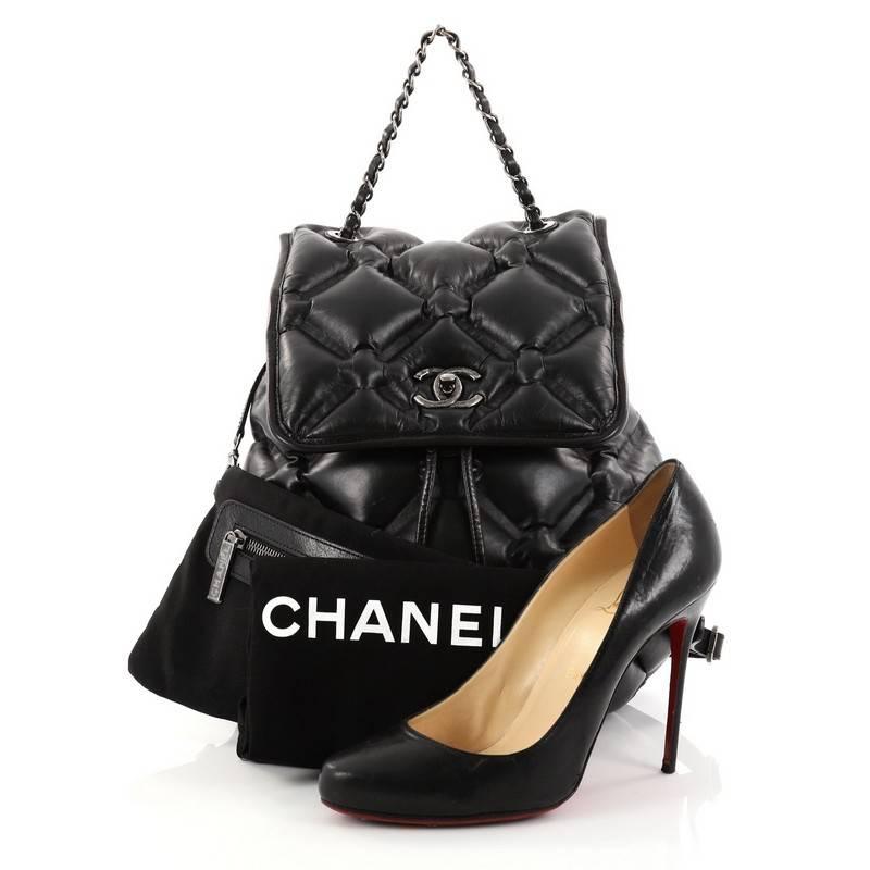 This authentic Chanel Chesterfield Backpack Quilted Calfskin Medium is from the brand's 2017 Collection that displays a fun and fabulous design. Crafted in black calfskin leather with an exaggerated quilted pattern, this chic backpack features
