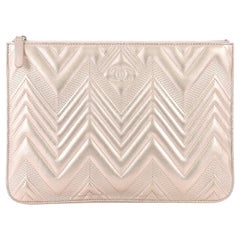 Chanel Chevron CC O Case Clutch Lambskin Medium