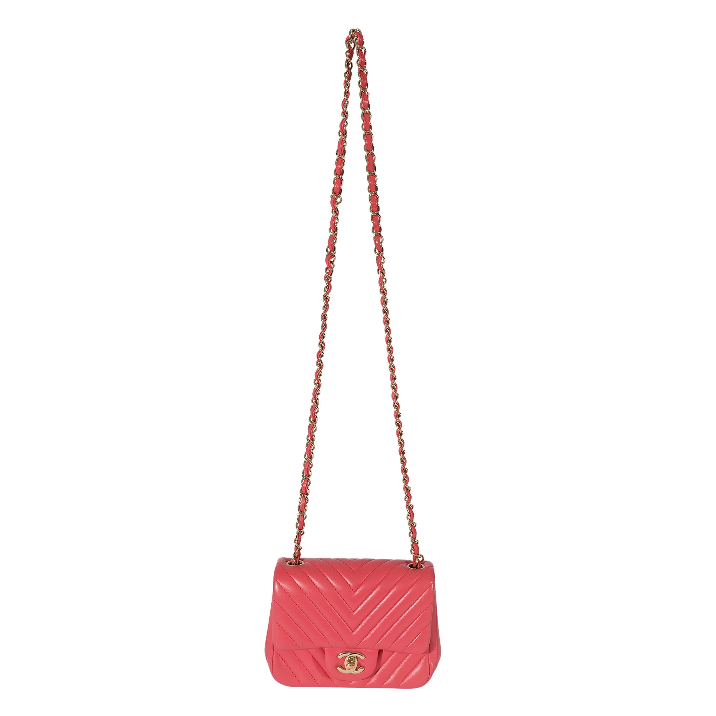 Listing Title: Chanel Chevron Pink Lambskin Mini Flap Bag
SKU: 127979
MSRP: 4200.00
Condition: Pre-owned 
Handbag Condition: Very Good
Condition Comments: Very Good Condition. Plastic at some hardware. Exterior faint scuffing at corners. Hardware