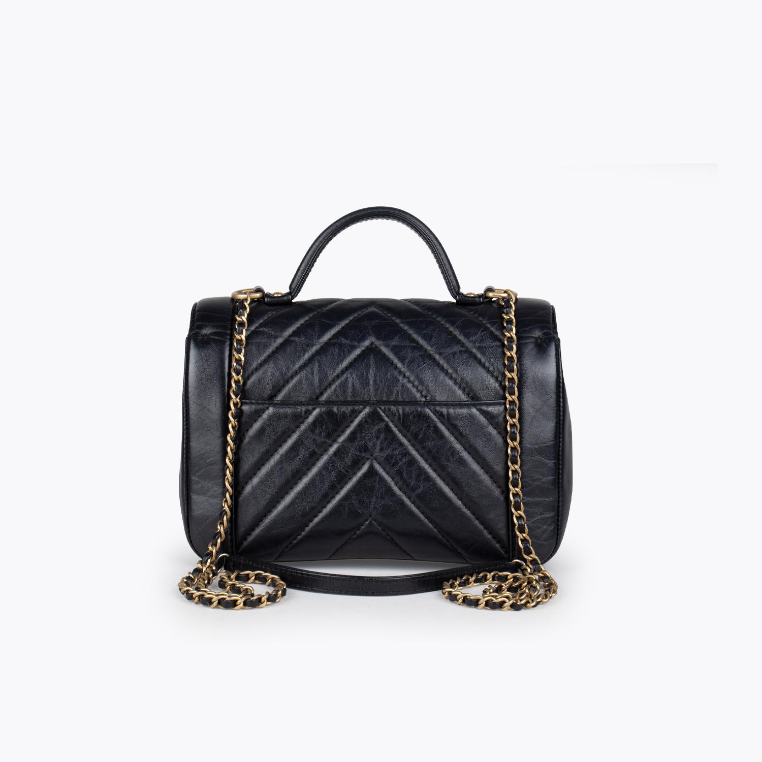 chanel chevron flap bag with top handle