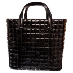 Chanel Chocolate Bag Small tote bag features a black quilted patent leather