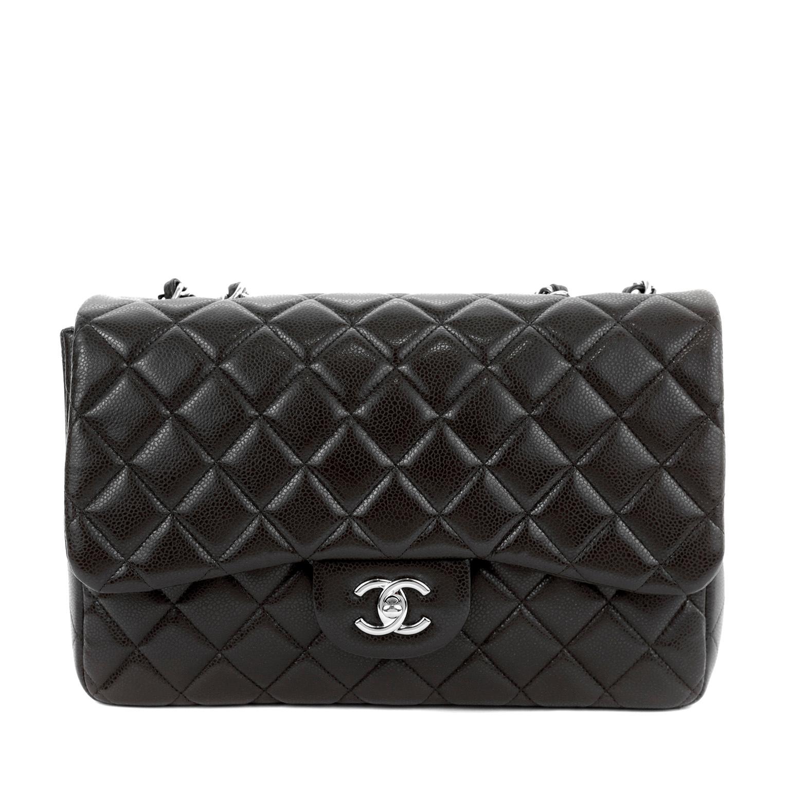 This authentic Chanel Chocolate Brown Caviar Jumbo Classic Flap Bag is in pristine condition.  A must have for any collector, the Jumbo Classic is elegant and timeless.

Durable and textured chocolate brown caviar leather is quilted in signature