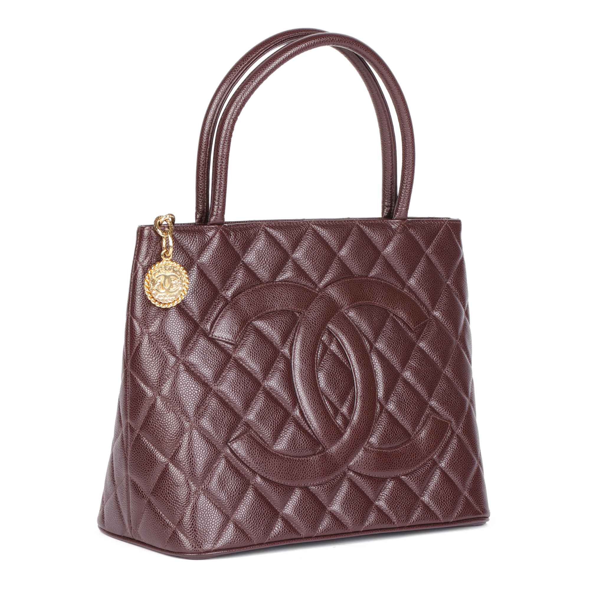 CHANEL
Chocolate Brown Quilted Caviar Leather Vintage Medallion Tote

Xupes Reference: HB4897
Serial Number: 7790000
Age (Circa): 2002
Accompanied By: Authenticity Card
Authenticity Details: Authenticity Card, Serial Sticker (Made in France)
Gender: