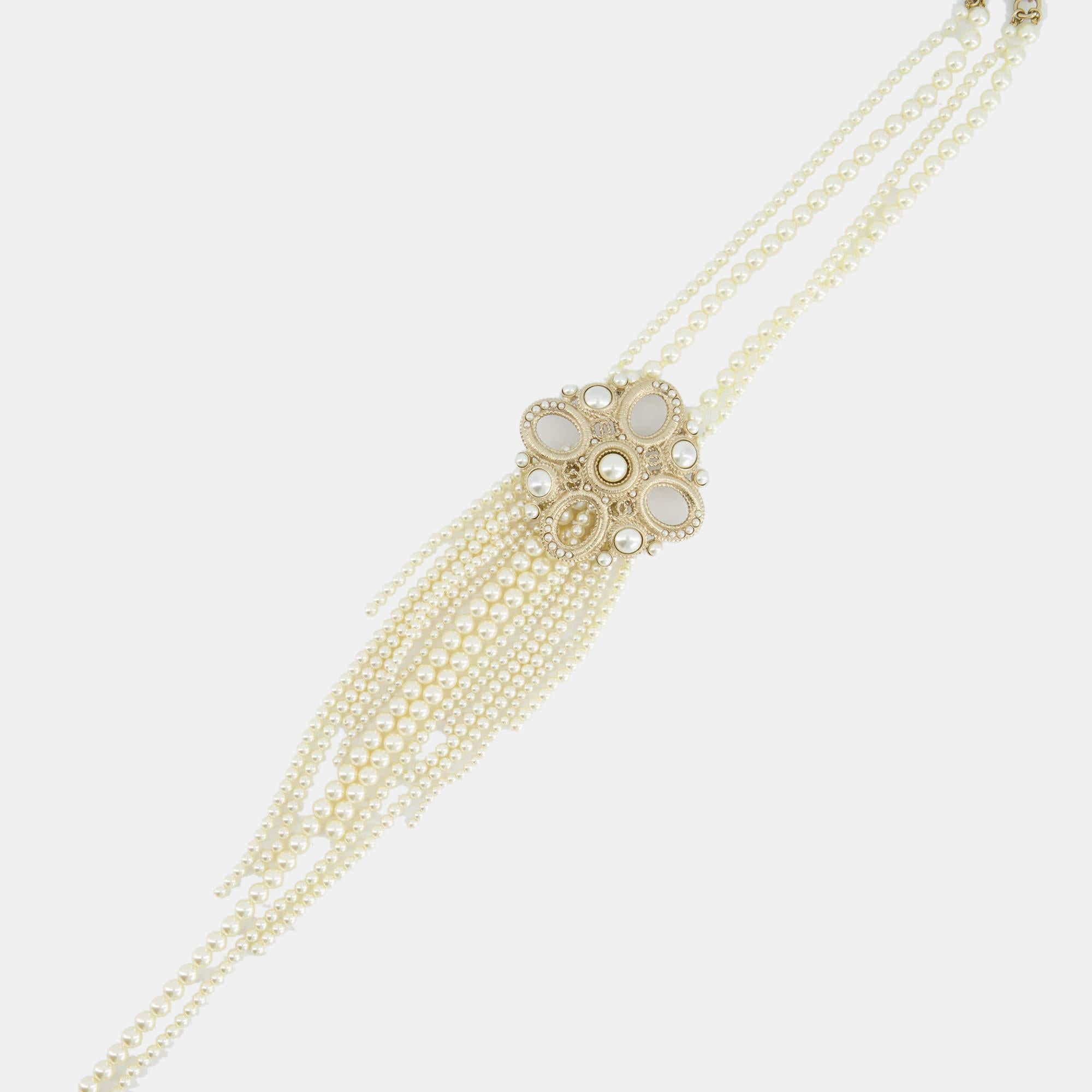 Elevate your elegance with this Chanel pearl necklace. Exquisite craftsmanship meets timeless design in this stunning piece, an embodiment of luxury and sophistication that complements every neckline.

