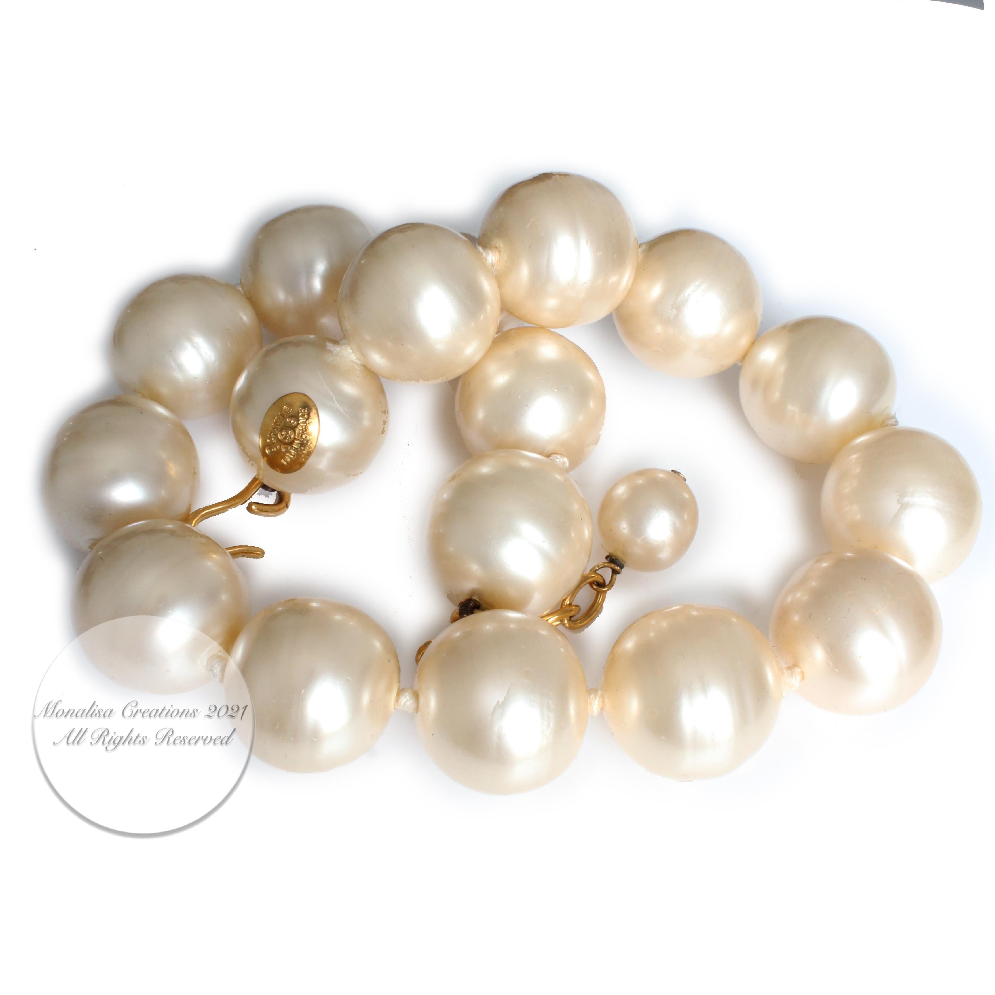 Iconic large Baroque pearl choker necklace from Chanel, circa 1990s and designed under Victoire de Castellane season 2 9.  Each pearl is approximately .75in x .65in and the total length (including fastener and chain) is 19.75in and adjustable from