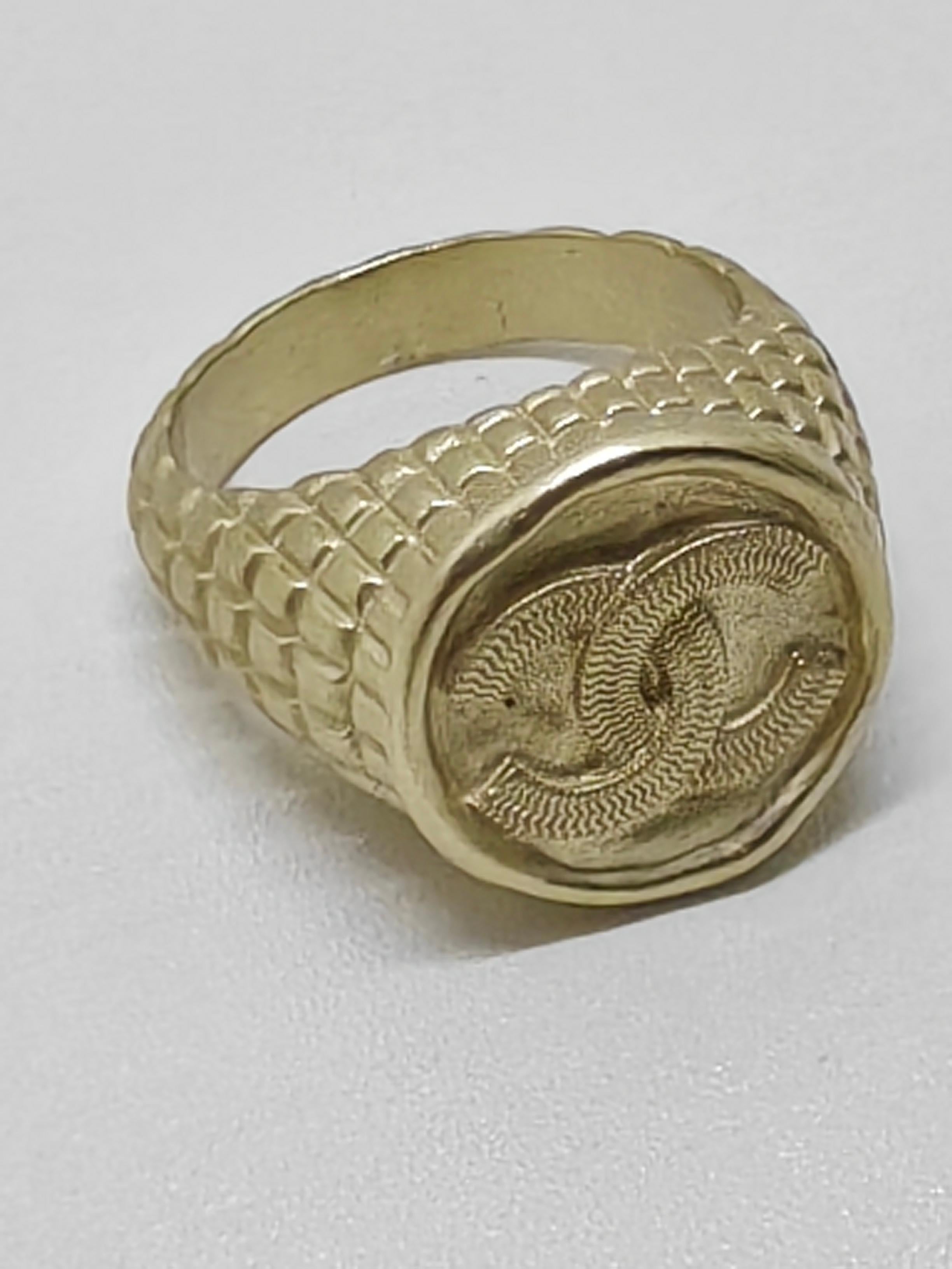 Bold, distinctive, and with a subtle antique touch, the Chunky CC Logo Matt Silver Ring from the A22 collection exudes timeless luxury with a modern twist. Crafted in matte silver, the oversized band features the iconic CC logo at its center,