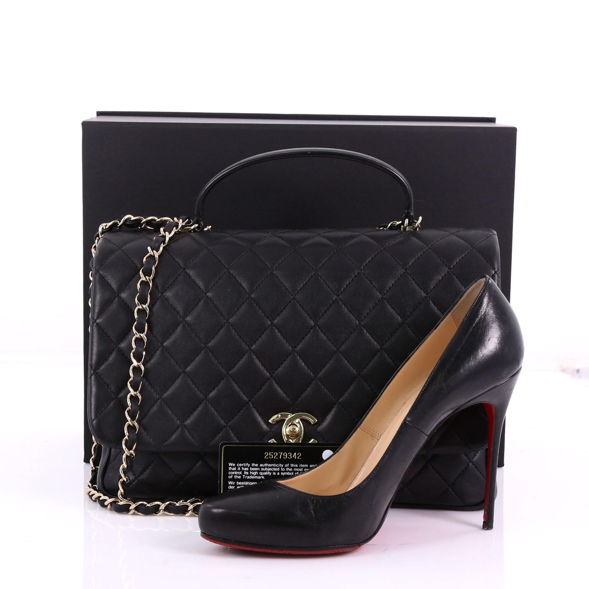 This Chanel Citizen Chic Top Handle Bag Quilted Lambskin Medium, crafted in black quilted lambskin leather, features single top leather handle, woven in leather chain link strap, and gold-tone hardware. Its CC turn-lock closure opens to a black