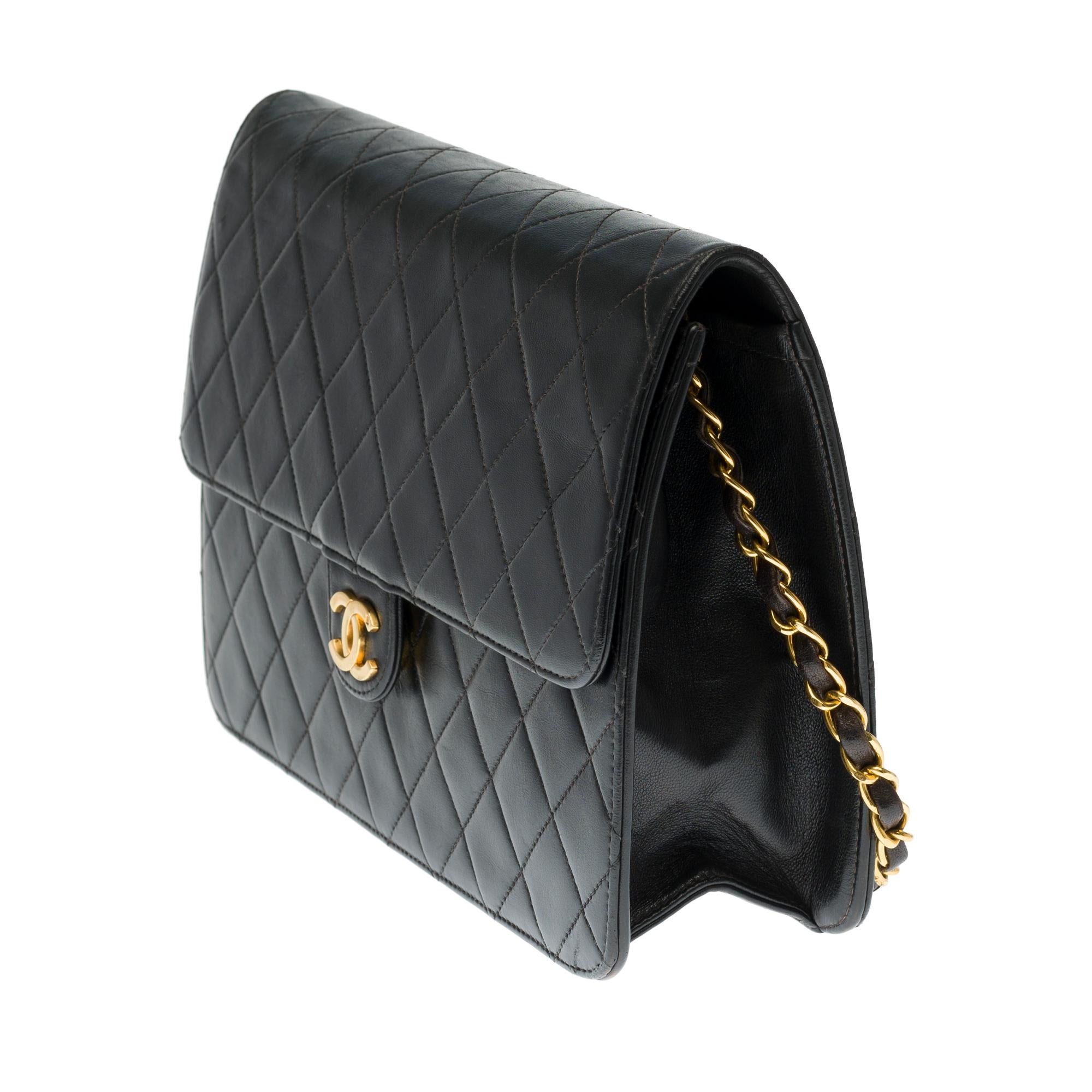 Black Chanel Classic 25cm shoulder bag in black quilted lambskin and gold hardware