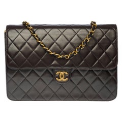 Chanel Classic 25cm shoulder bag in black quilted lambskin and gold hardware