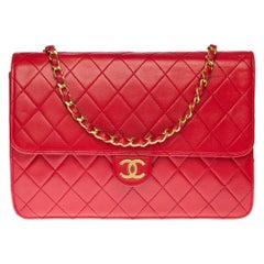 Chanel Classic 25cm shoulder bag in Red quilted lambskin and gold hardware