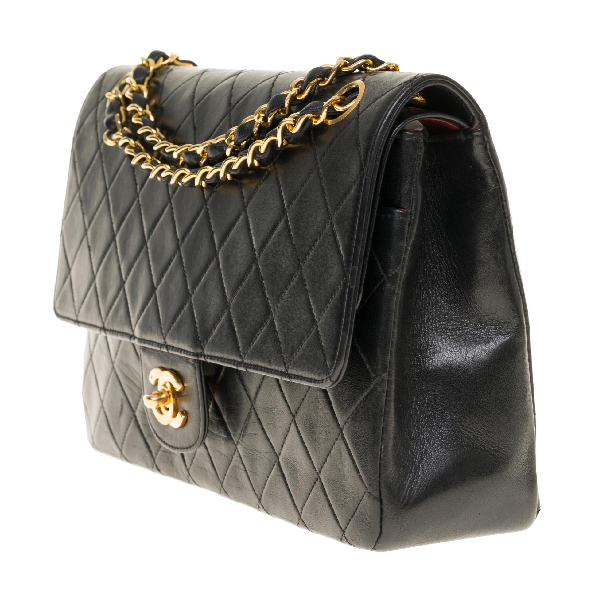 Black Chanel Classic 27cm shoulder bag in black quilted lambskin and gold hardware