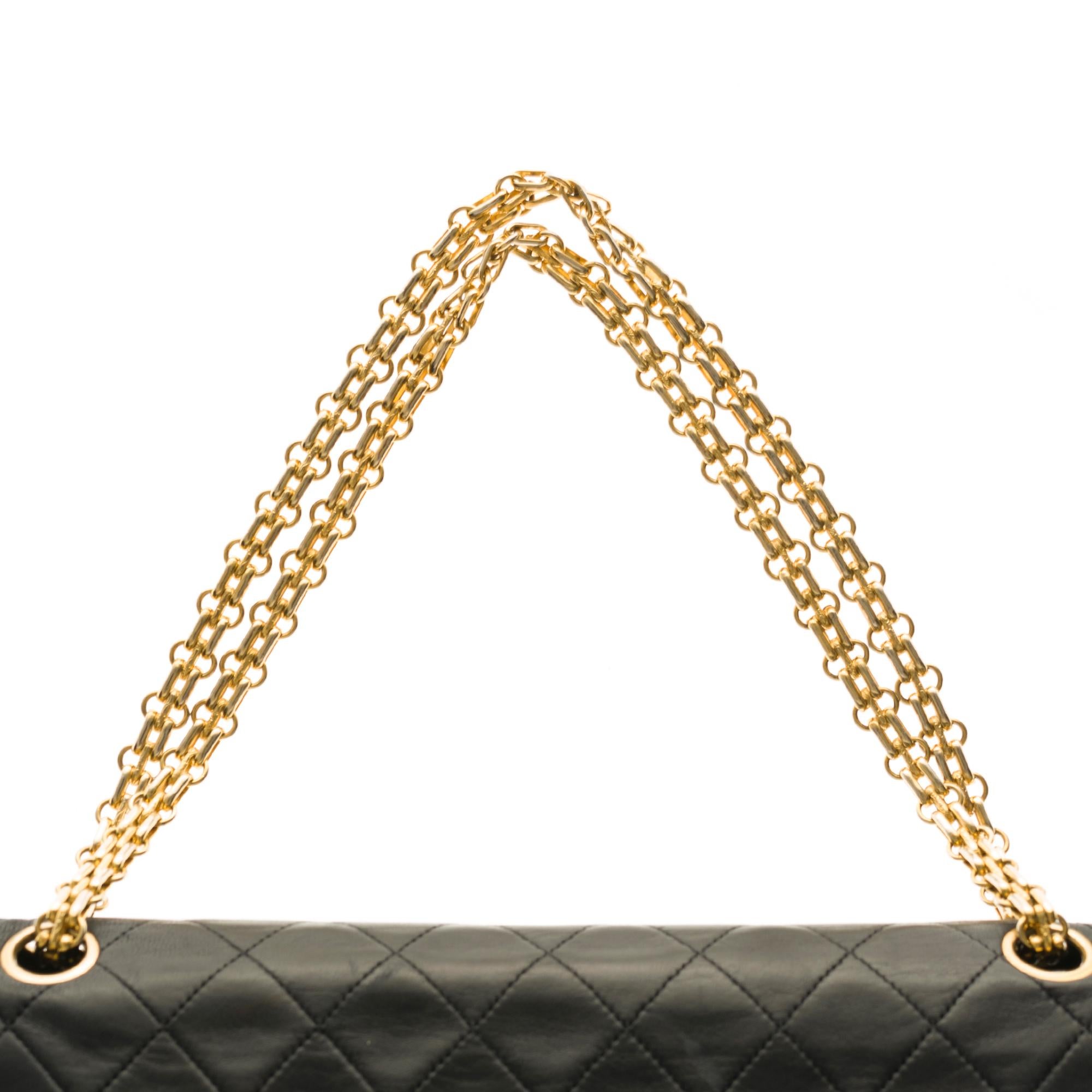 Chanel Classic 27cm shoulder bag in black quilted lambskin and gold hardware In Good Condition In Paris, IDF