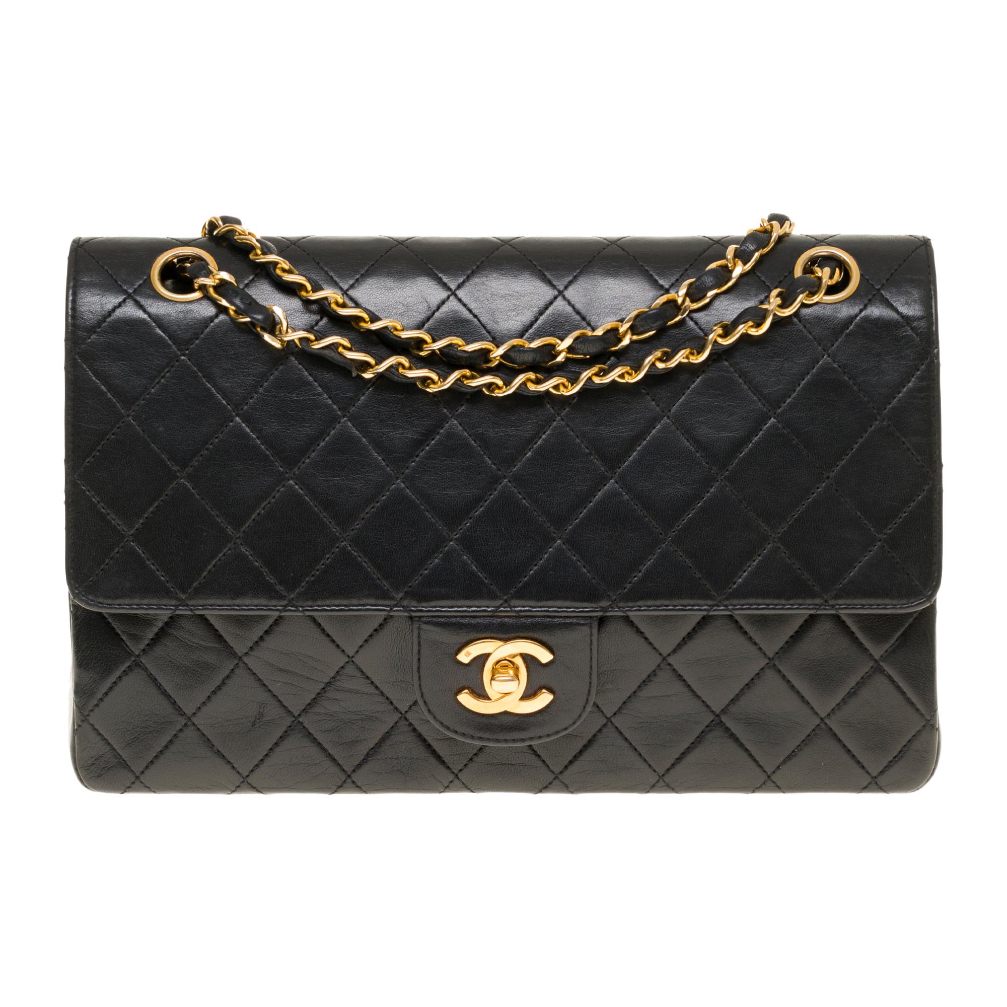Chanel Classic 27cm shoulder bag in black quilted lambskin and gold hardware