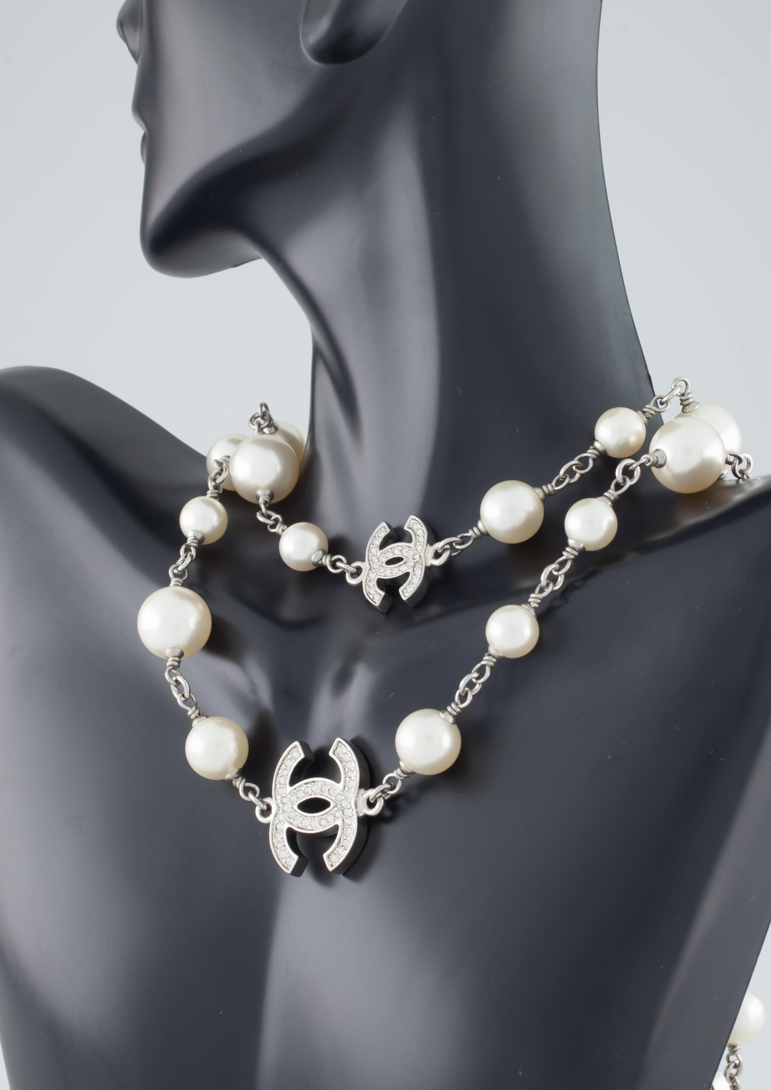 Chanel Classic Long Pearl Necklace with 5 CC Silver Crystal Logos at  1stDibs | chanel classic necklace, chanel classic pearl necklace, pearl  necklace logo