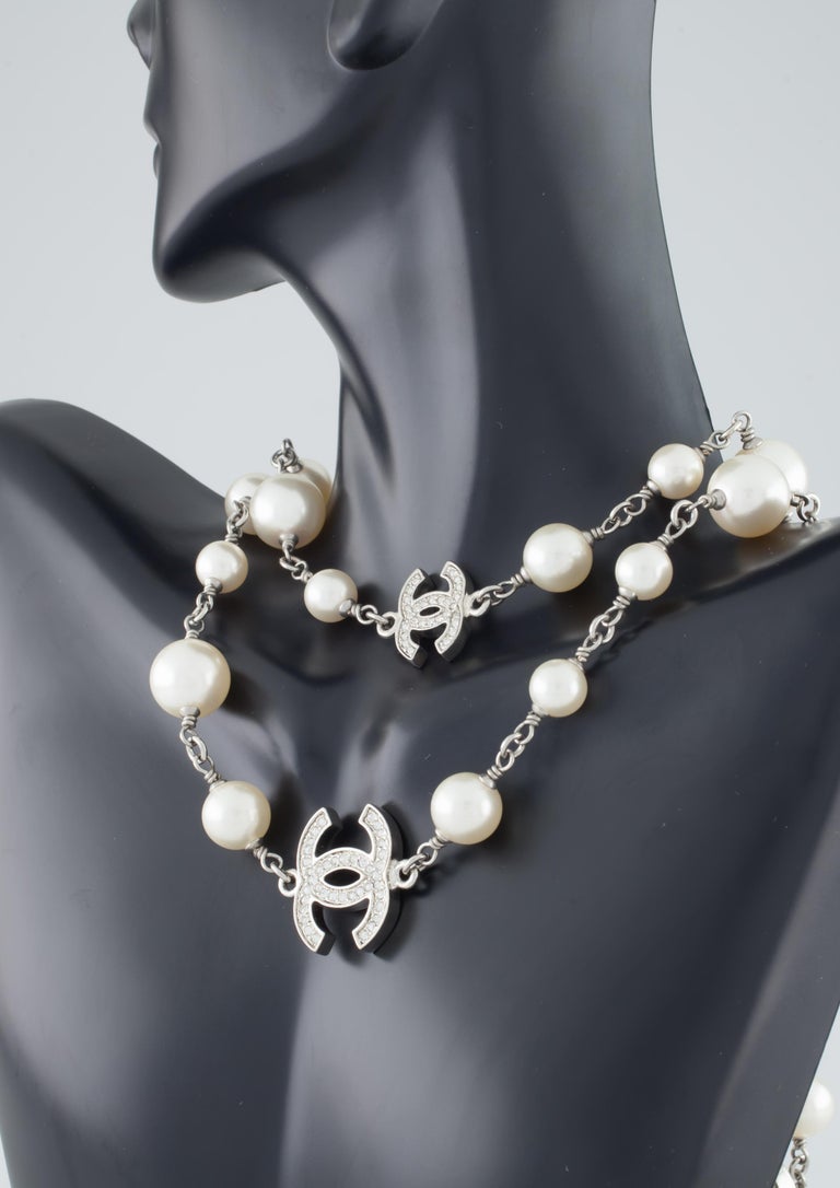 Chanel Classic Long Pearl Necklace with 5 CC Silver Crystal Logos at