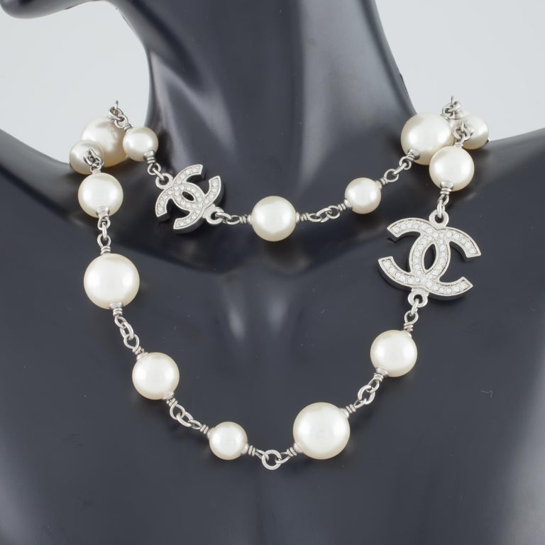 Chanel Classic Long Pearl Necklace with 5 CC Silver Crystal Logos at