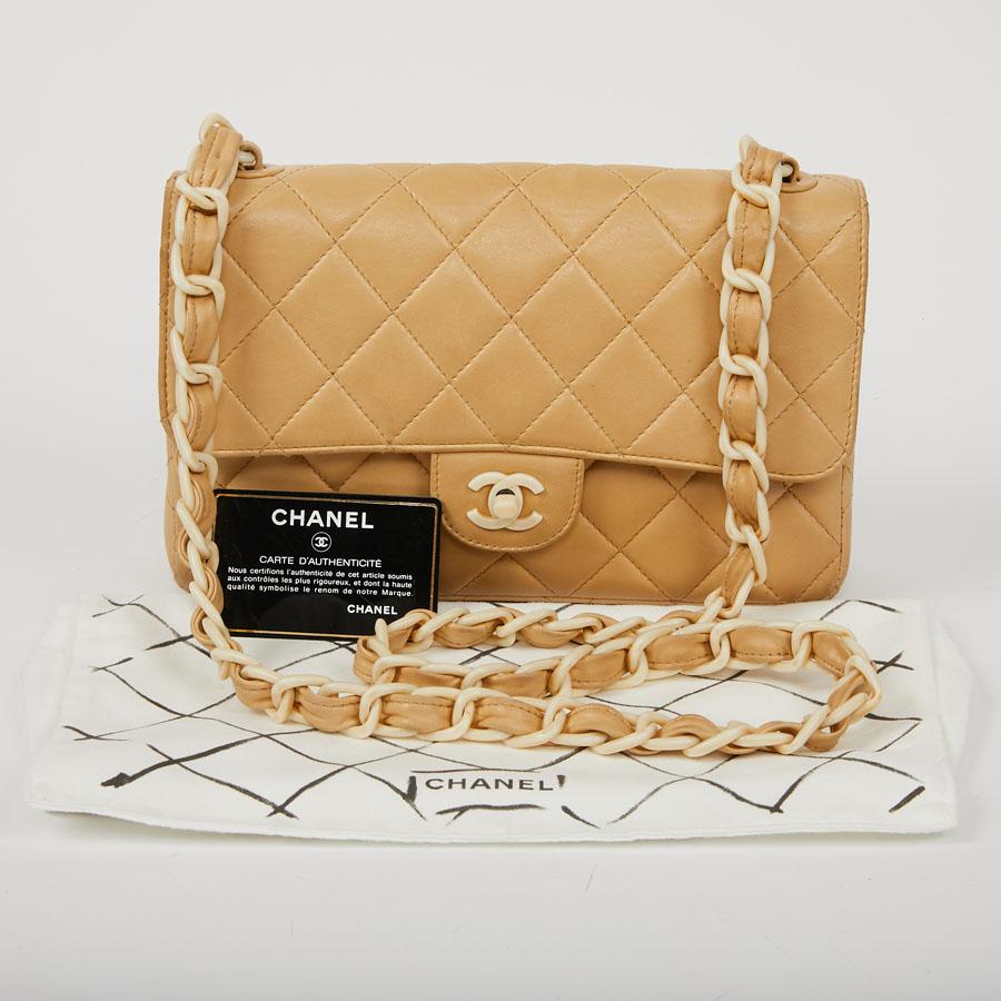 beige chanel flap bag outfit