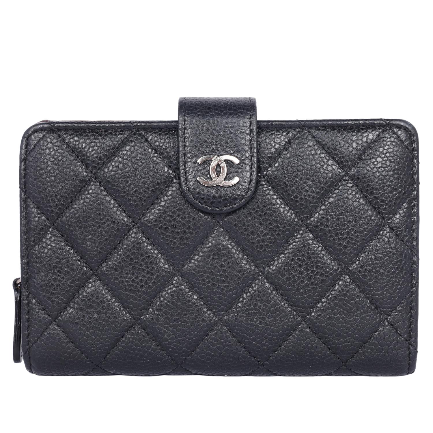 Authentic, pre-loved Chanel classic black caviar quilted French wallet. Features caviar leather, front cc silver snap closure with interior that has 10 cc slots, 3 pockets, billfold and zipper back pocket with slip rear pocket.

Authenticity