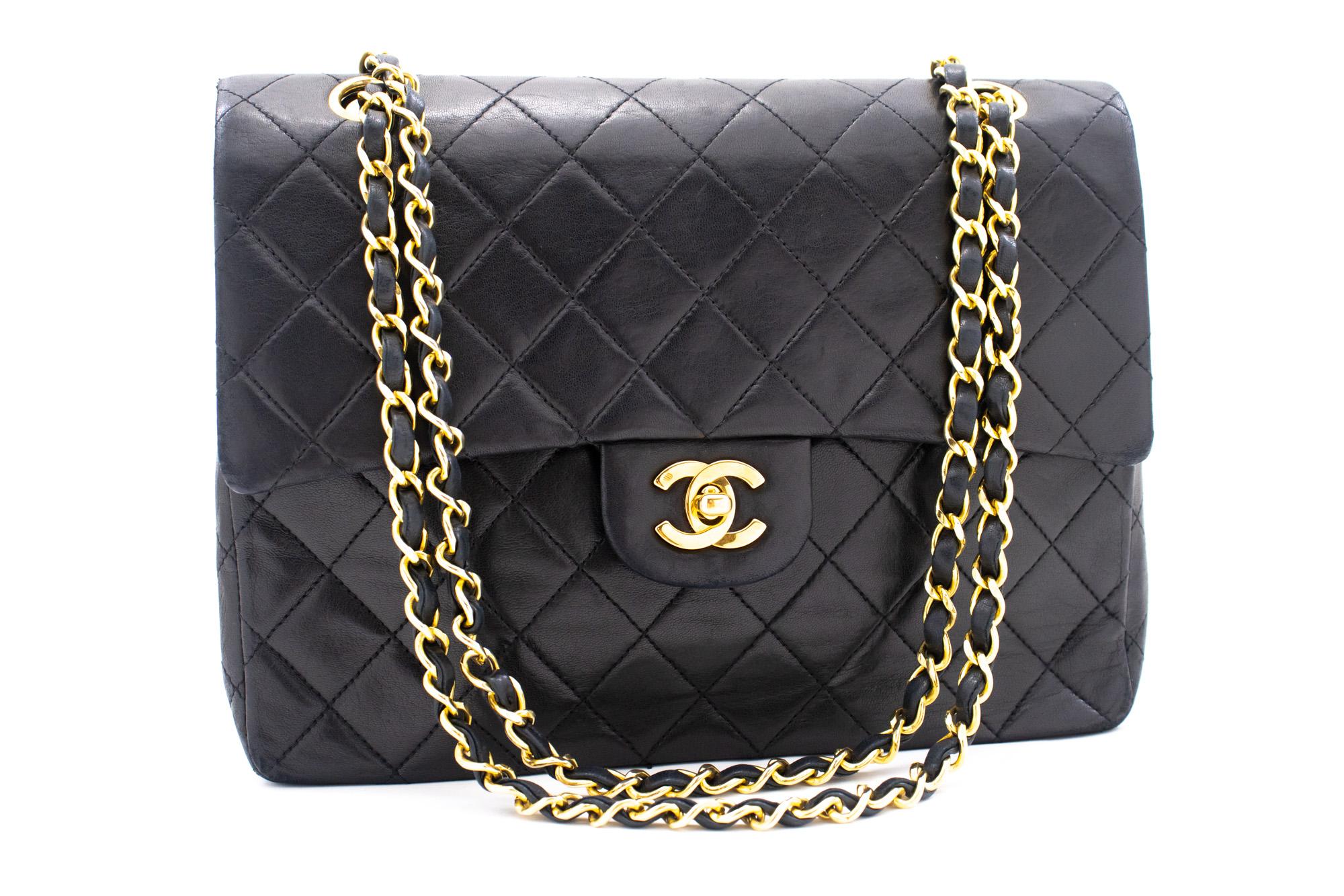 An authentic CHANEL Classic Double Flap Chain Shoulder Bag Black made of black Lambskin Purse. The color is Black. The outside material is Leather. The pattern is Solid. This item is Vintage / Classic. The year of manufacture would be