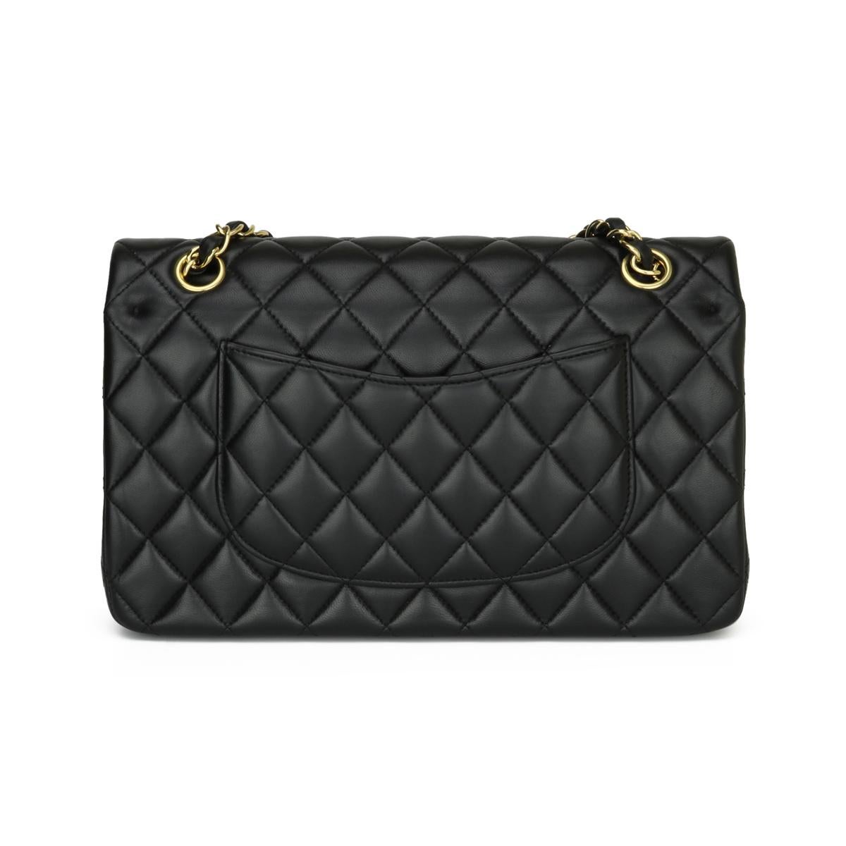 CHANEL Classic Double Flap Bag Medium Black Lambskin with Gold Hardware 2016.

This stunning bag is still in excellent condition, the bag still holds its original shape, and the hardware is very shiny. Leather still smells fresh as if new.

-