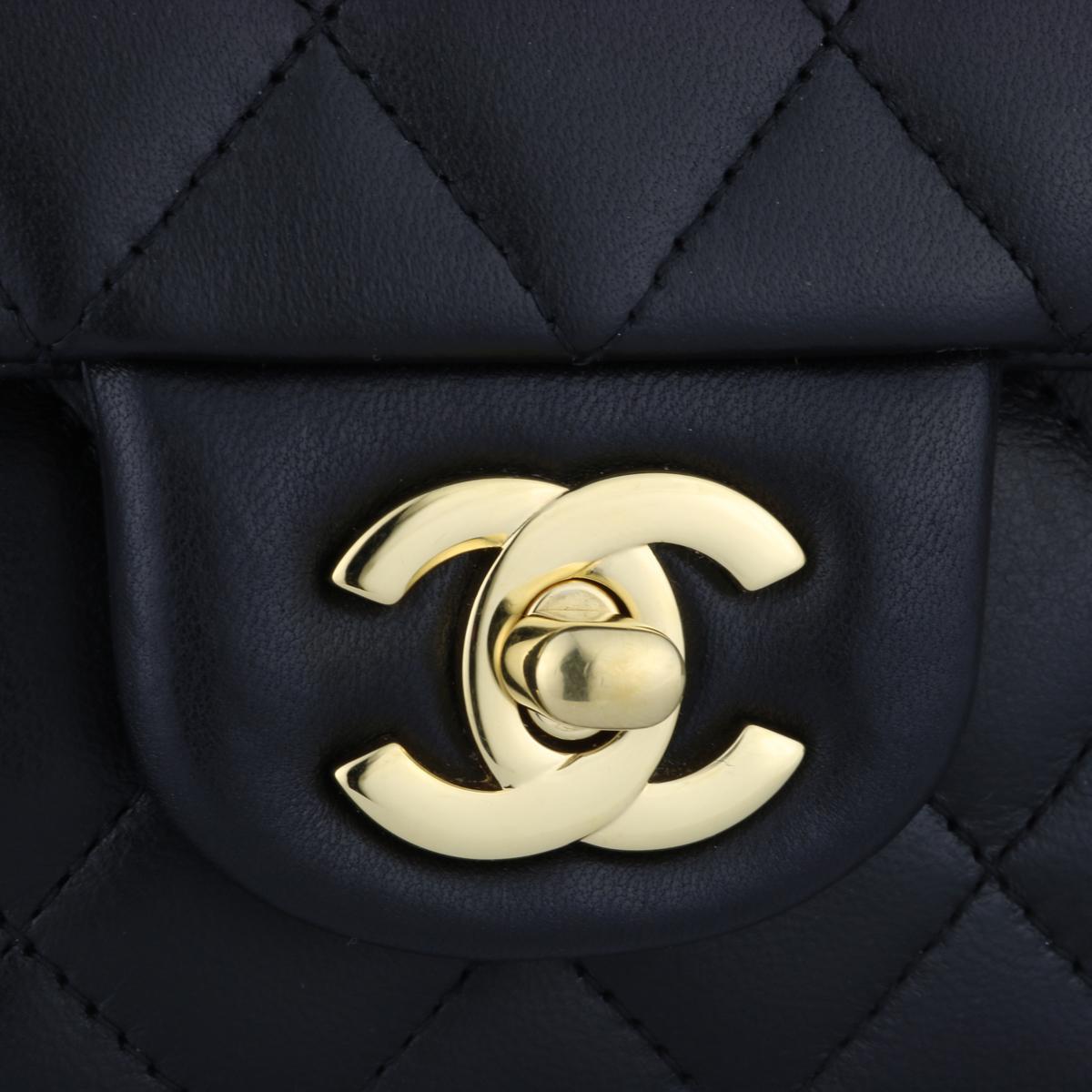 Authentic CHANEL Classic Double Flap Bag Medium Black Lambskin with Gold Hardware 2016.

This stunning bag is still in mint condition, the bag still holds its original shape, and the hardware is very shiny. Leather still smells fresh as if