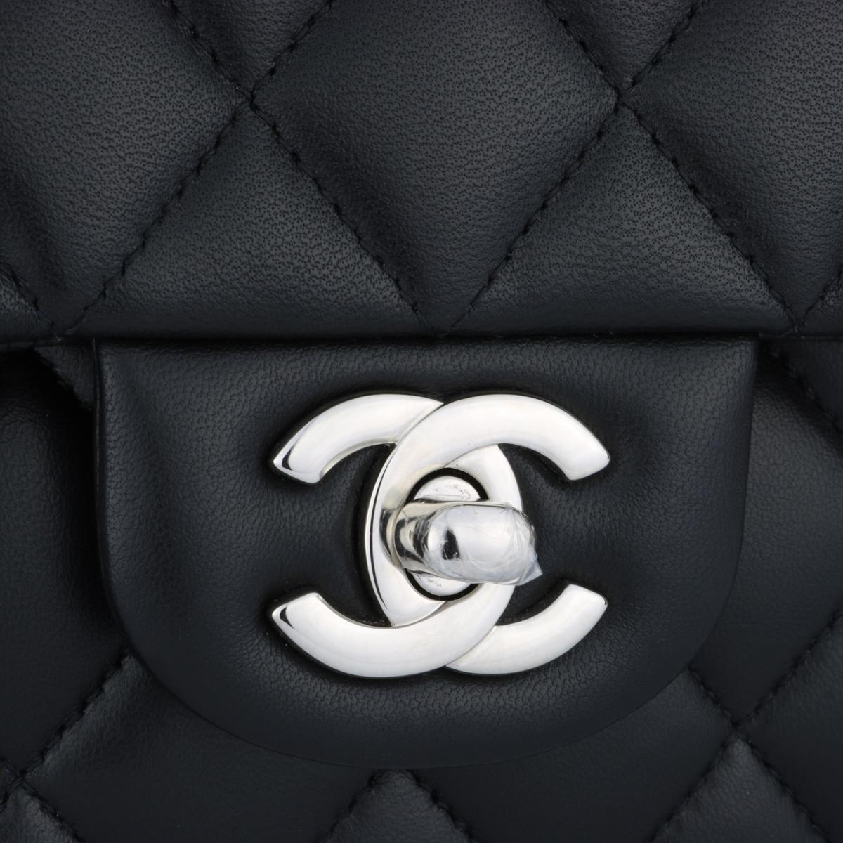 Authentic CHANEL Classic Double Flap Bag Medium Black Lambskin with Silver Hardware 2019.

This stunning bag is still in brand new condition, the bag still holds its original shape, and the hardware is very shiny. Leather still smells fresh as if