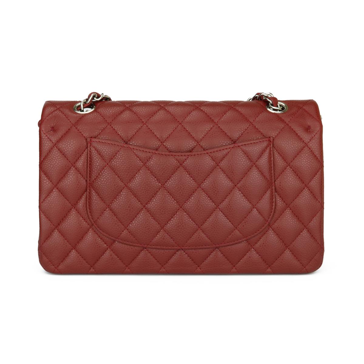 CHANEL Classic Double Flap Bag Medium Burgundy Caviar with Silver Hardware 2014.

This stunning bag is still in pristine condition, the bag still holds its original shape, and the hardware is very shiny. Leather still smells fresh as if new.

-