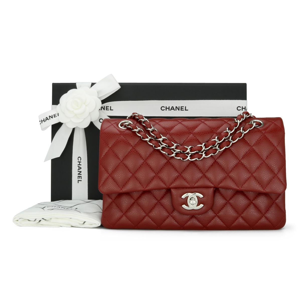 CHANEL Classic Double Flap Bag Medium in Dark Red Caviar with Silver-Tone Hardware 2013 – 13B.

This stunning bag is still in immaculate condition; the bag still holds its original shape, and the hardware is very shiny. Leather still smells fresh,