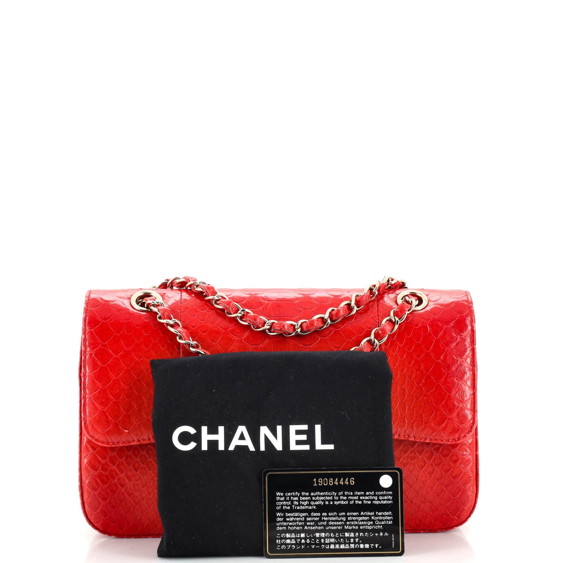 This item can only be shipped within the United States.

Condition: Very good. Light odor in interior. Slight lifting of scales on exterior, moderate wear and discoloration on exterior edges and strap, small marks on rear. Wear, scuffs, marks and