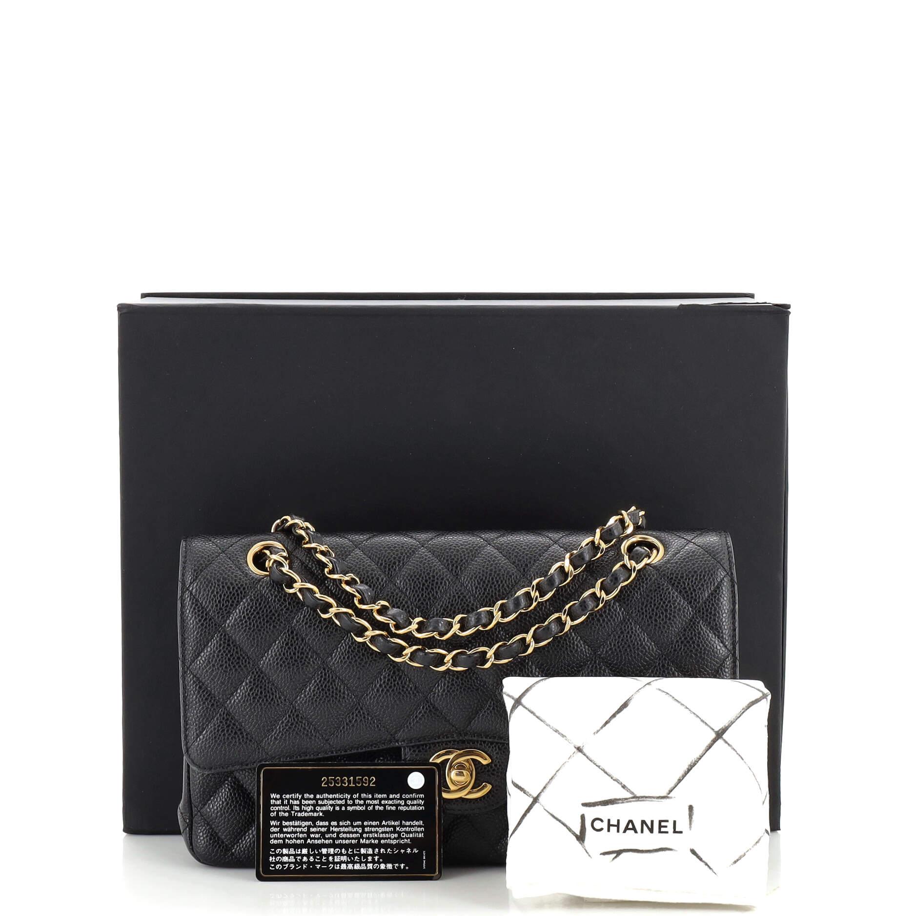 Condition: Good. Stiff zipper track underneath flap. Moderate wear on base and flap corners, moderate wear, scuffs and marks underneath interior flap and in interior, scratches and discoloration on hardware.
Accessories: Dust Bag, Authenticity Card,