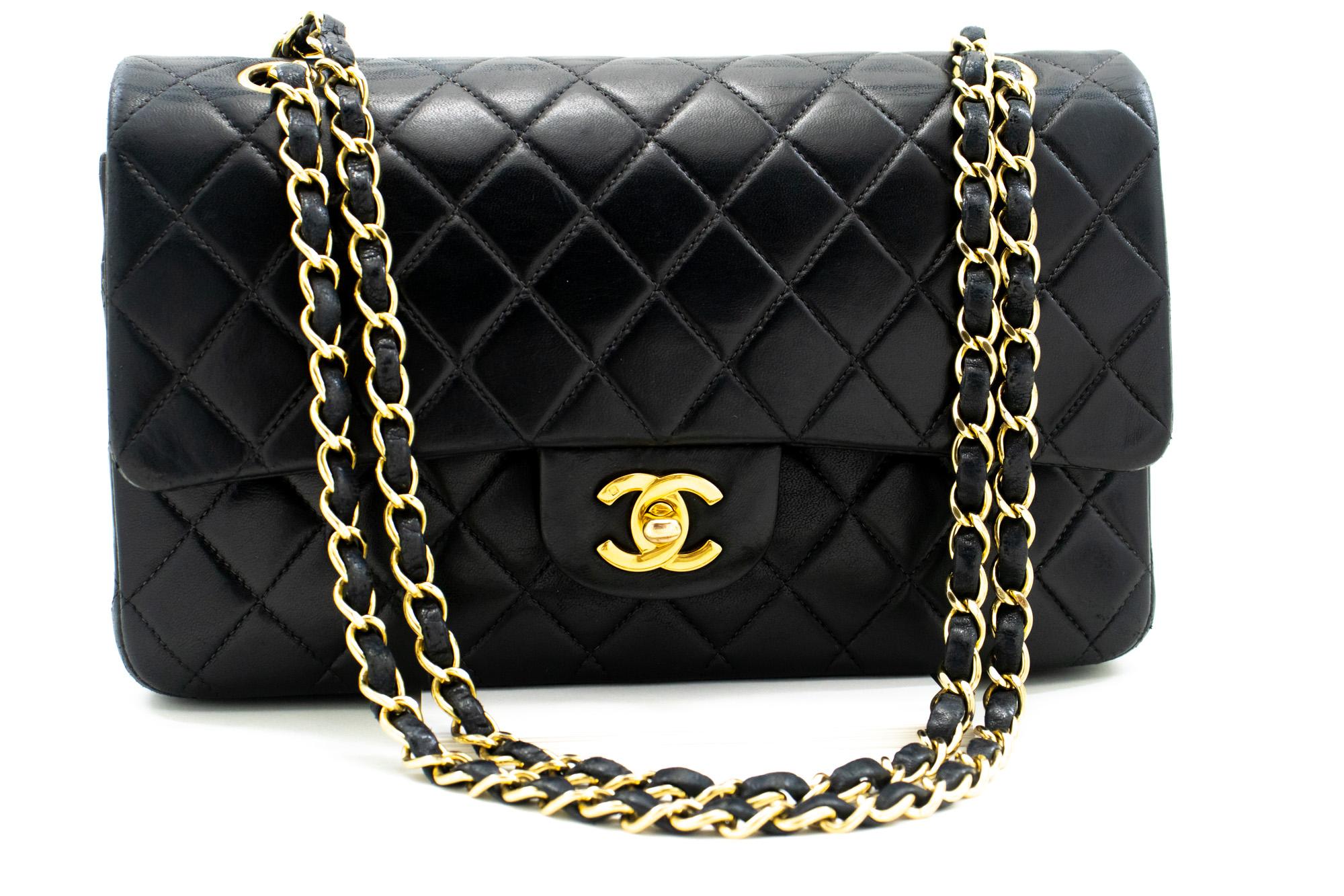 An authentic CHANEL Classic Double Flap Medium Chain Shoulder Bag Black Lamb. The color is Black. The outside material is Leather. The pattern is Solid. This item is Vintage / Classic. The year of manufacture would be 2000-2 0 0 2 .
Conditions &