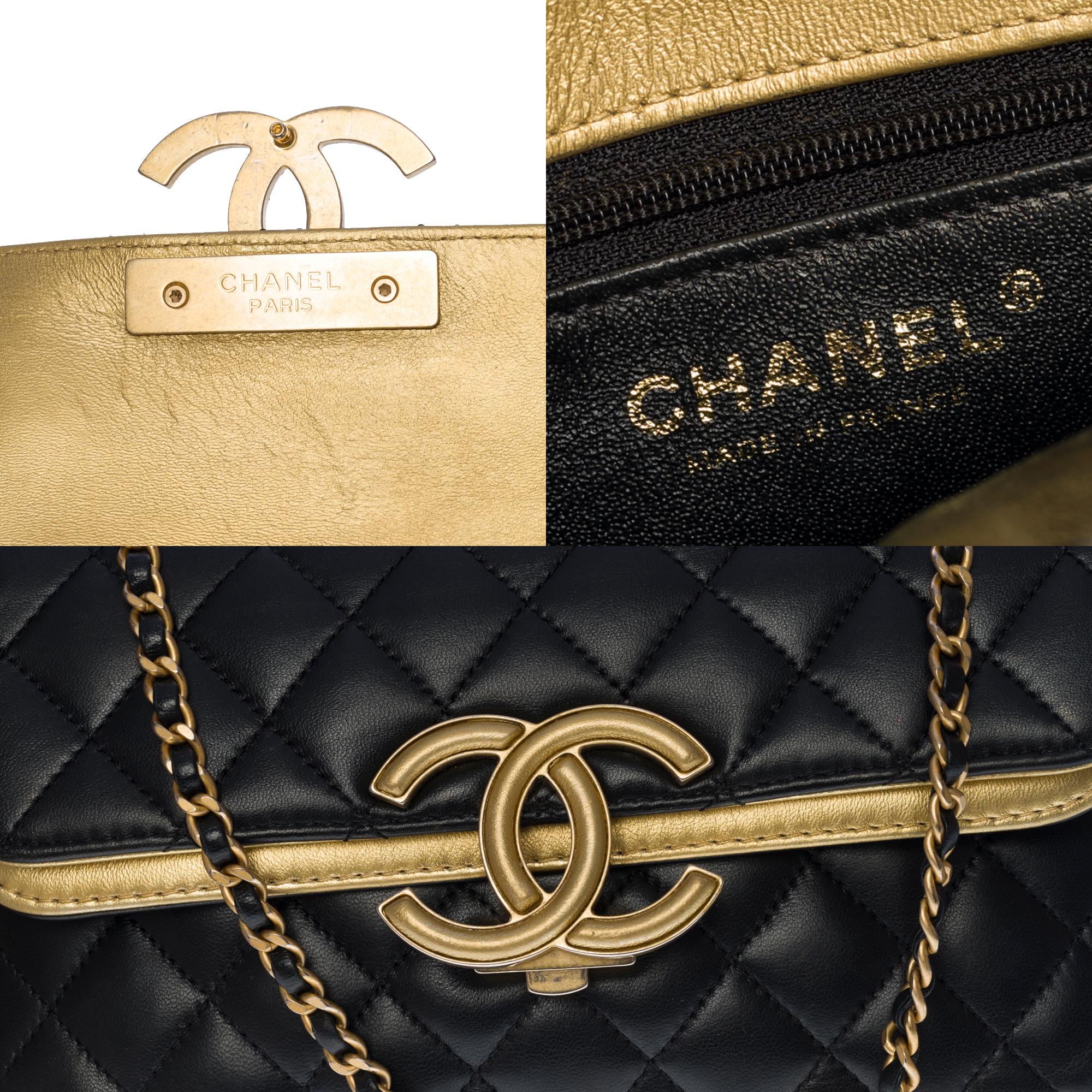 Black Chanel Classic double flap shoulder bag in black and gold quilted leather , GHW