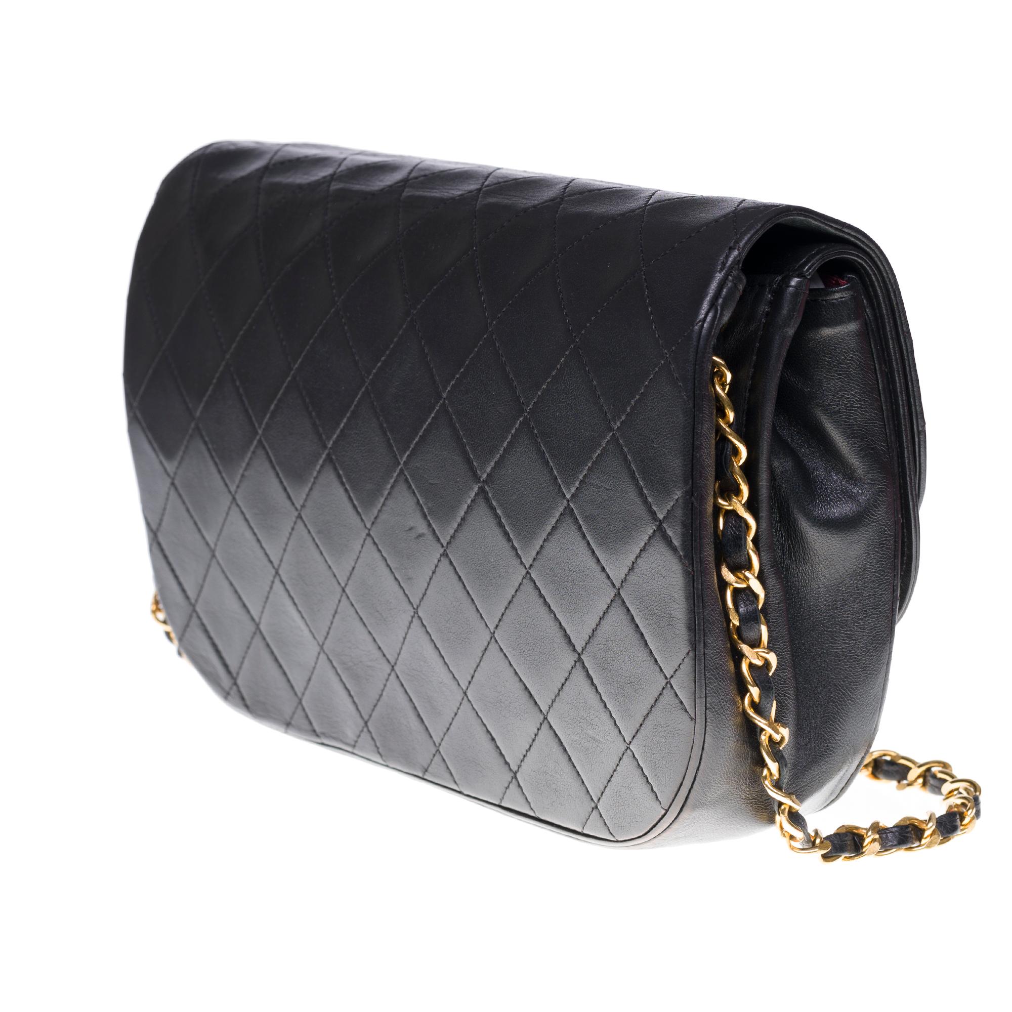 Women's Chanel Classic double Flap shoulder bag in Black quilted lambskin and GHW