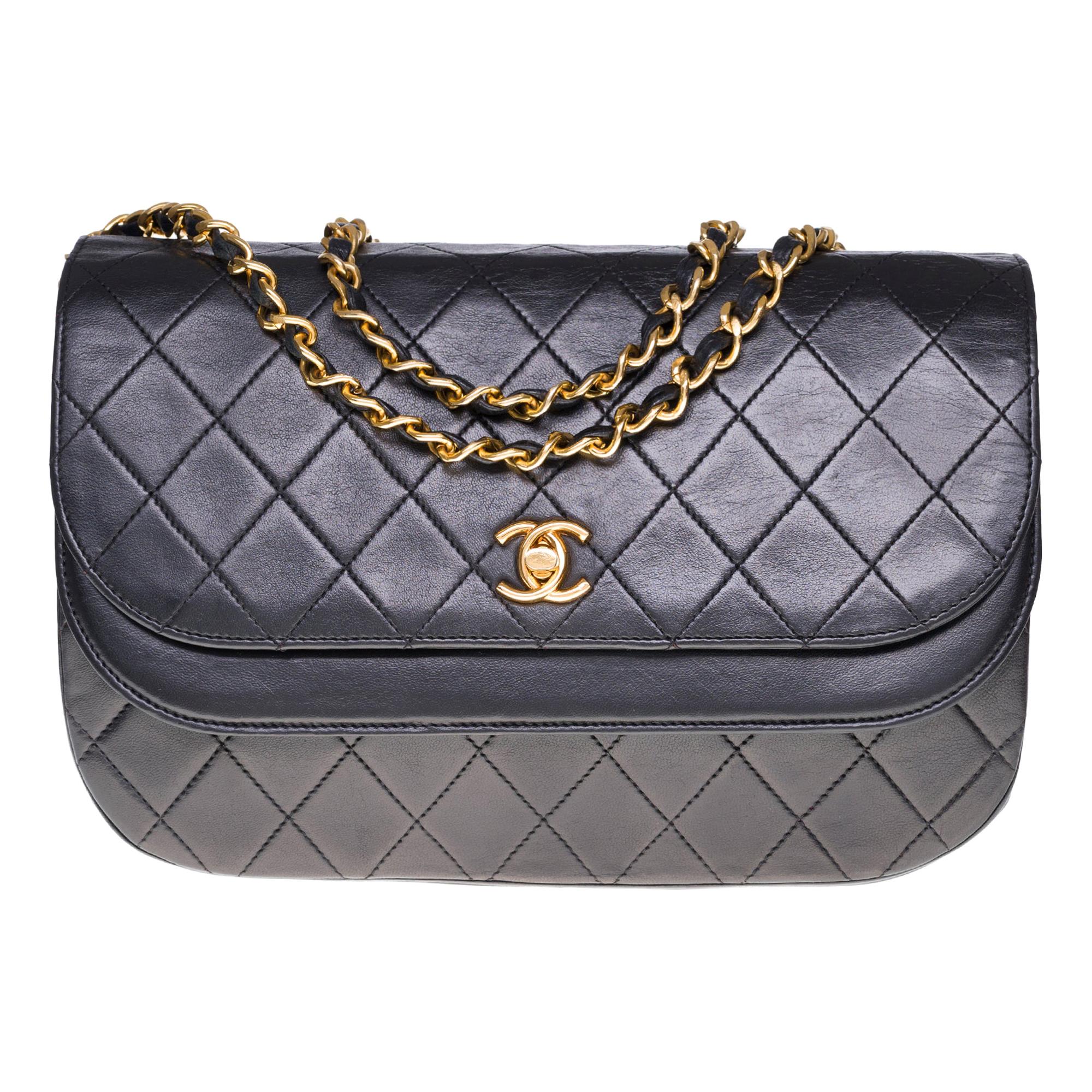 Chanel Classic double Flap shoulder bag in Black quilted lambskin and GHW