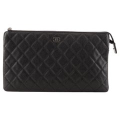 Chanel Classic Double Pocket Zip Pouch Quilted Caviar Medium