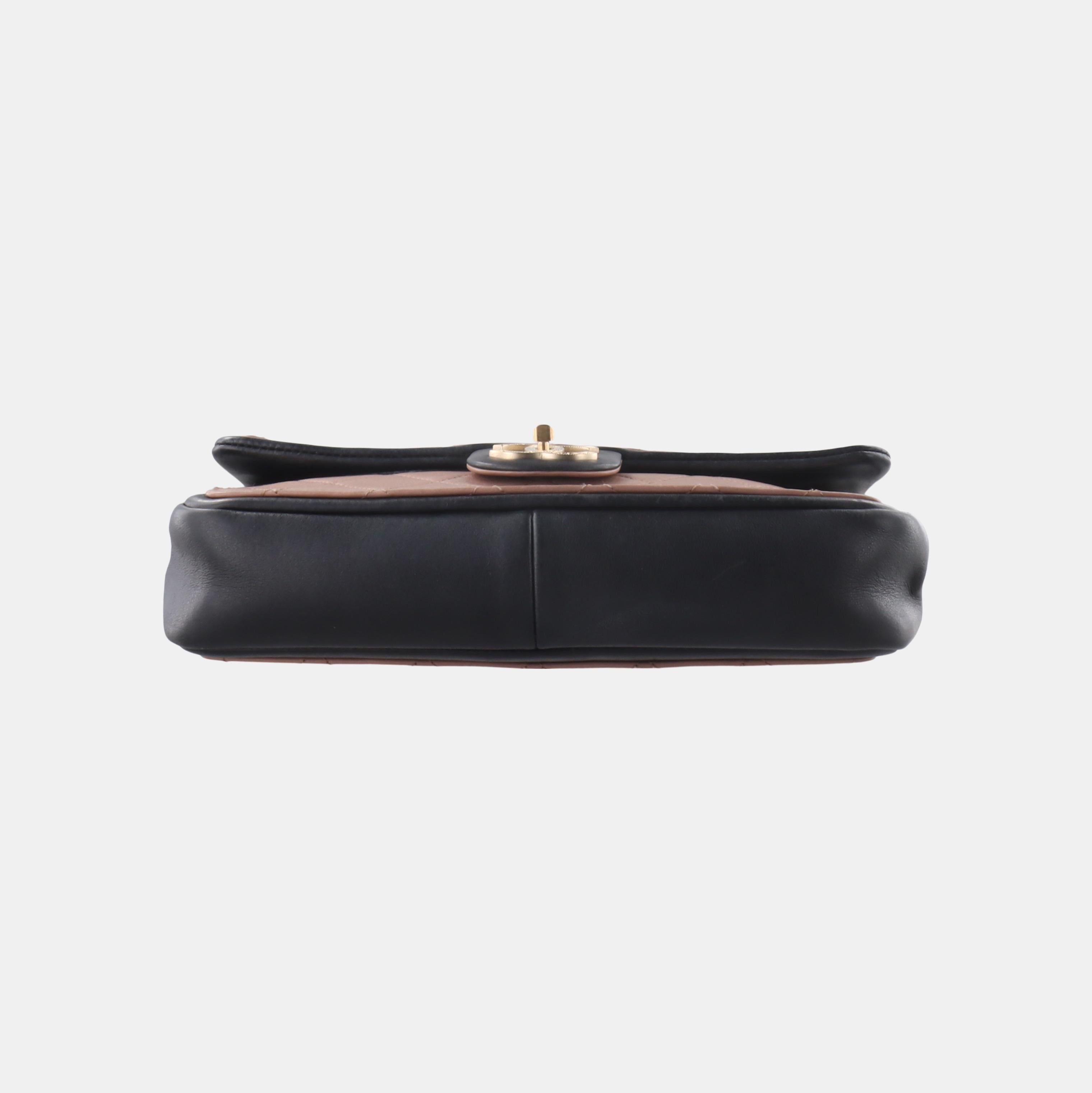 Chanel Classic Flap Bag Calfskin Leather 2014 Medium Nude Pink with Black Trim
  These are professional photos of the actual bag offered by Luxbags.
  CONDITION: VERY GOOD
  This preloved item is in very good condition with moderate signs of wear