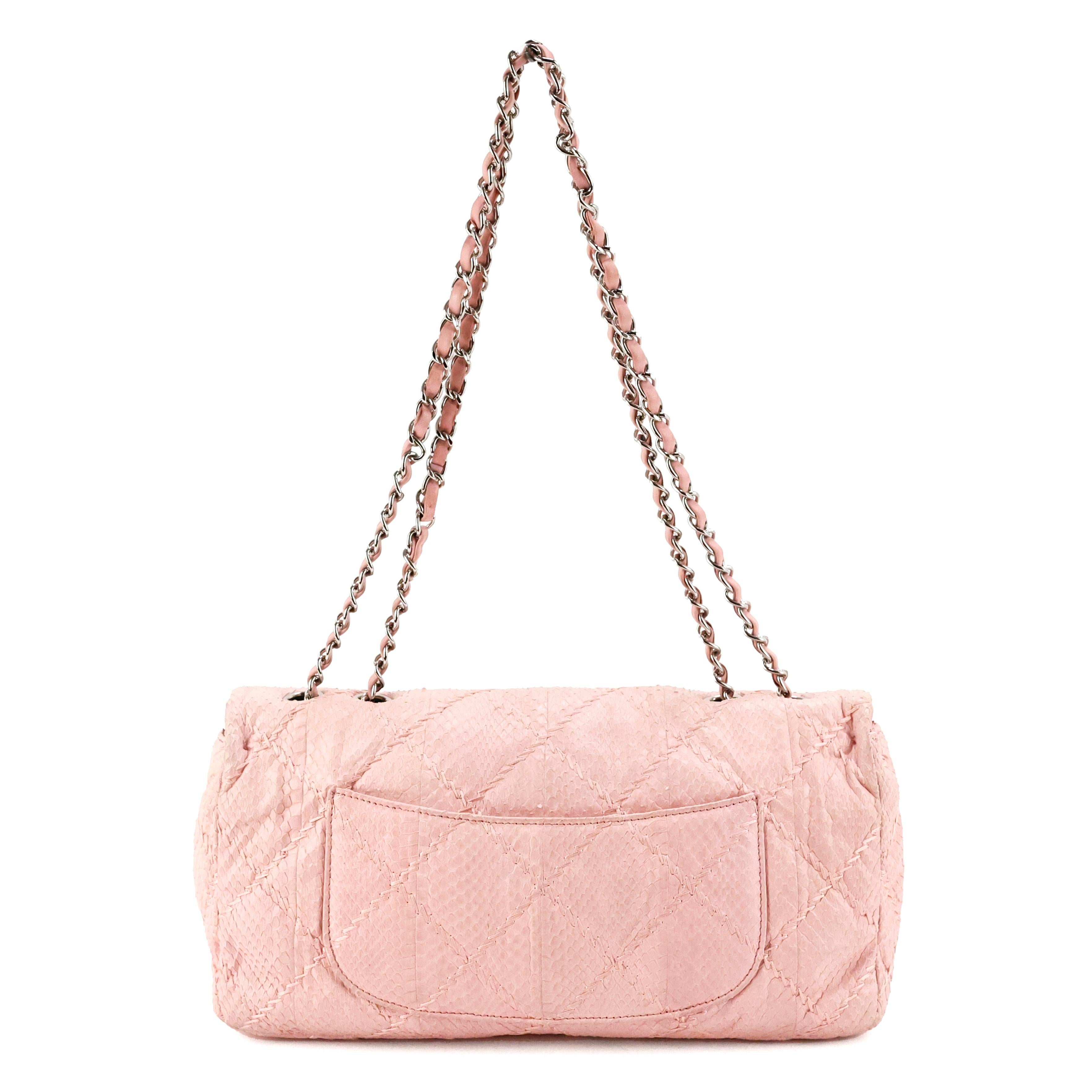 Chanel timeless bag in light pink python leather, silver hardware.


Condition:
Really good, to note: color tone slightly faded (doesn't affects the final appearance).


Packing/accessories:
Dustbag.


Measurements:
31cm x 16cm x 6cm