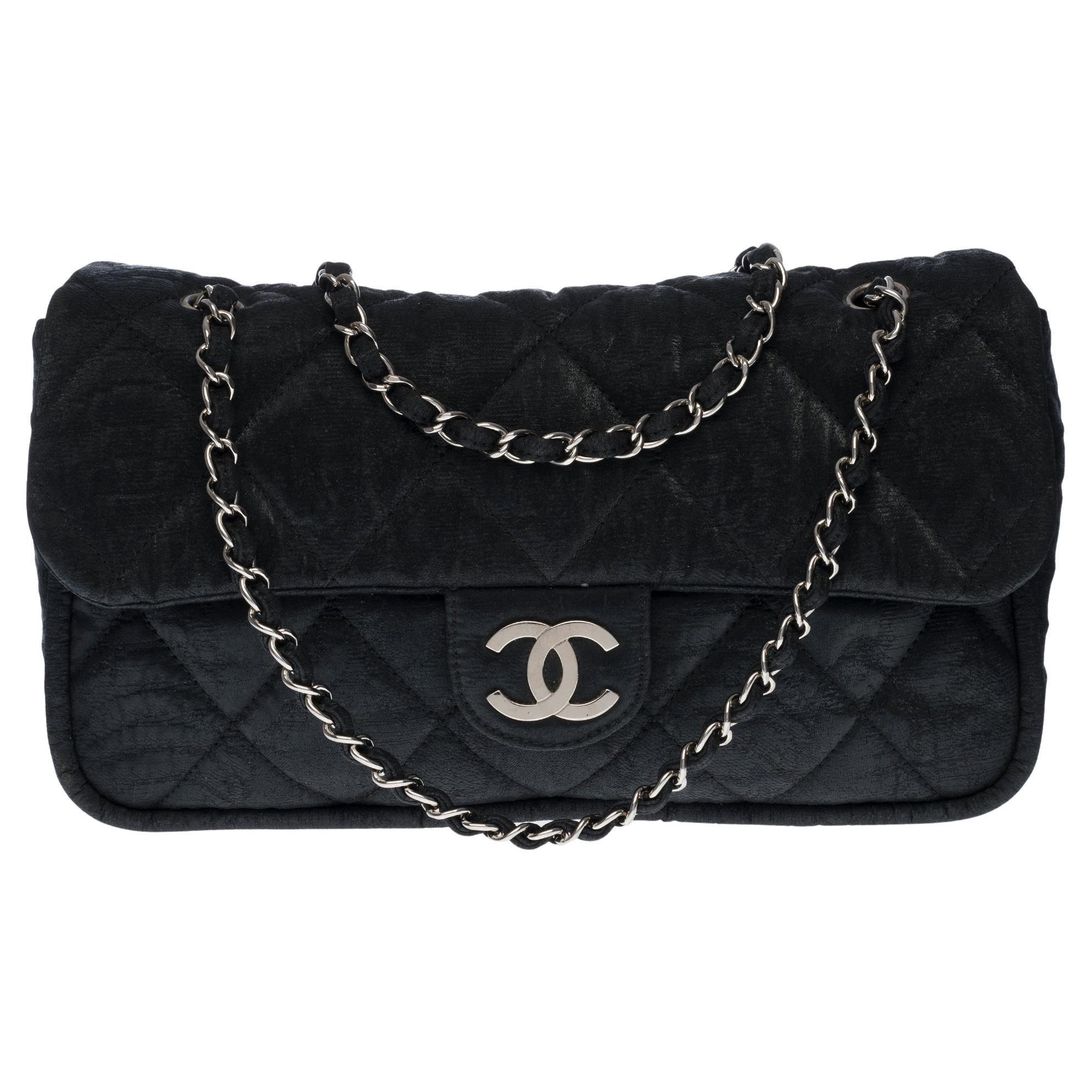Chanel Classic Flap bag shoulder bag in black quilted fabric and silver hardware