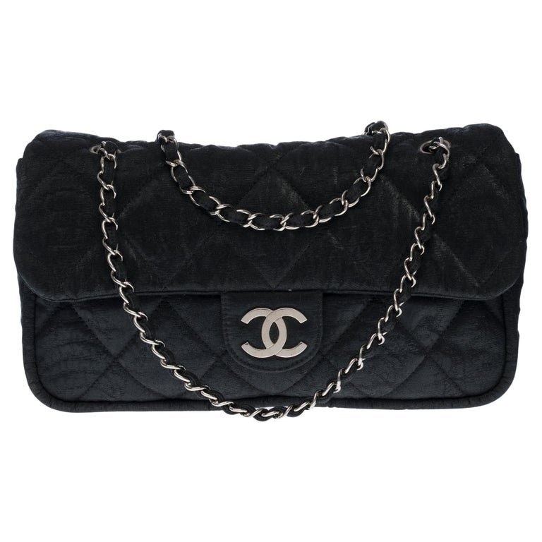 Chanel Classic Flap bag shoulder bag in black quilted fabric and silver  hardware at 1stDibs | chanel fabric flap bag, chanel fabric bag, chanel  black fabric bag