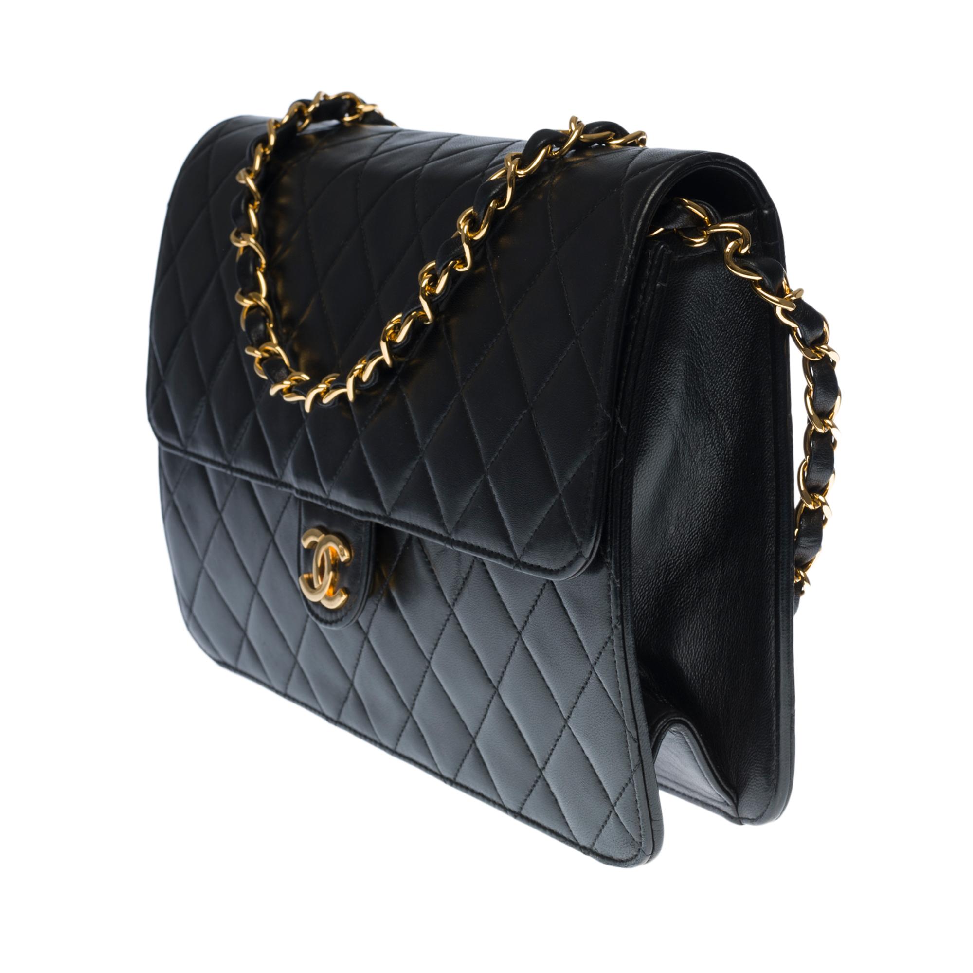 Black Chanel Classic Flap bag shoulder bag in black quilted lambskin and gold hardware